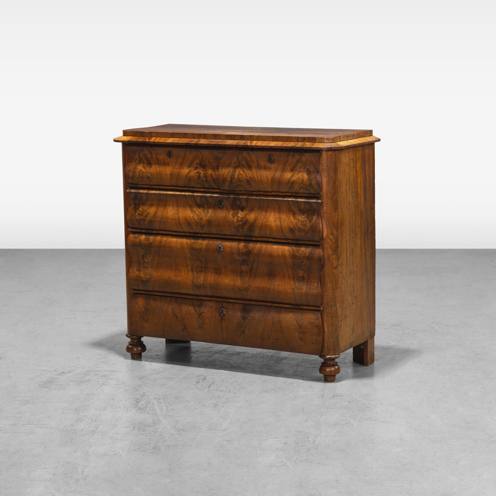 Biedermeier Mahogany Chest: An antique Biedermeier mahogany chest of drawers. All measurements are in inches. Height x Width x Depth