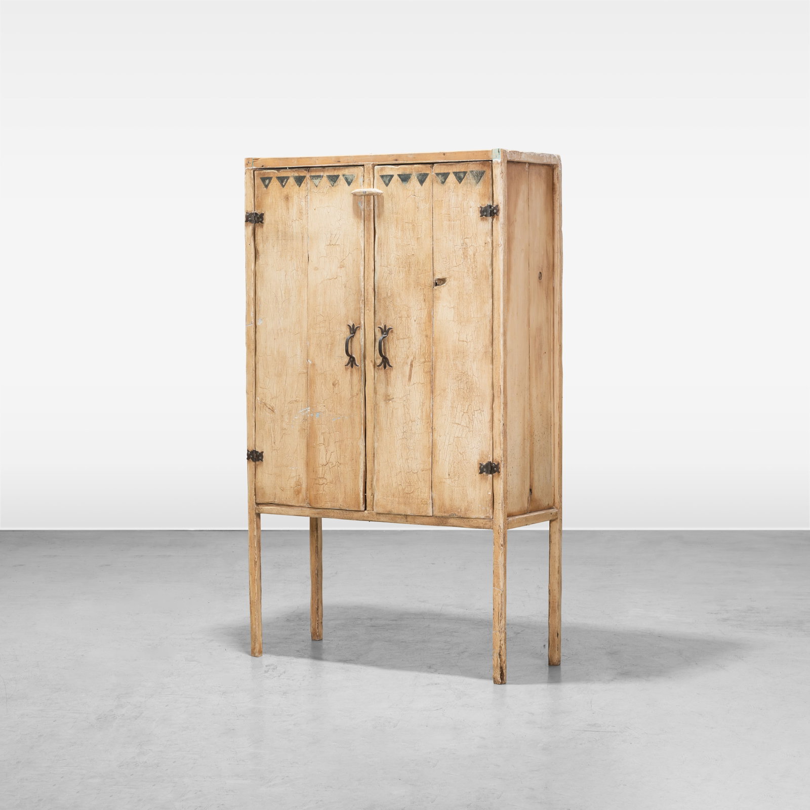 Primitive Style Cabinet: A two-door primitive style cabinet. All measurements are in inches. Height x Width x Depth