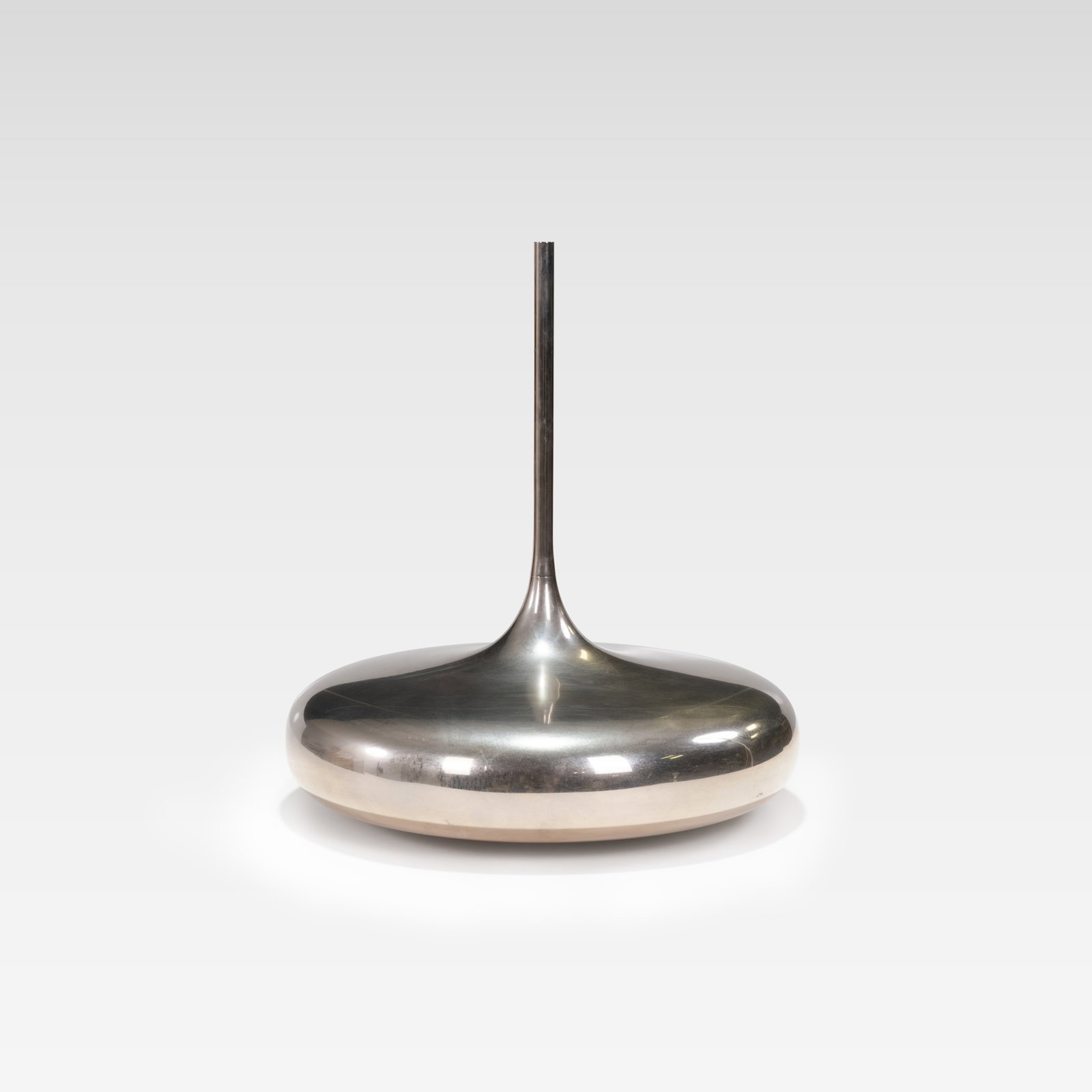 Italian Bud Vase: A metal bud vase by Il Punto la Bottega, Italy. All measurements are in inches. Height x Width x Depth