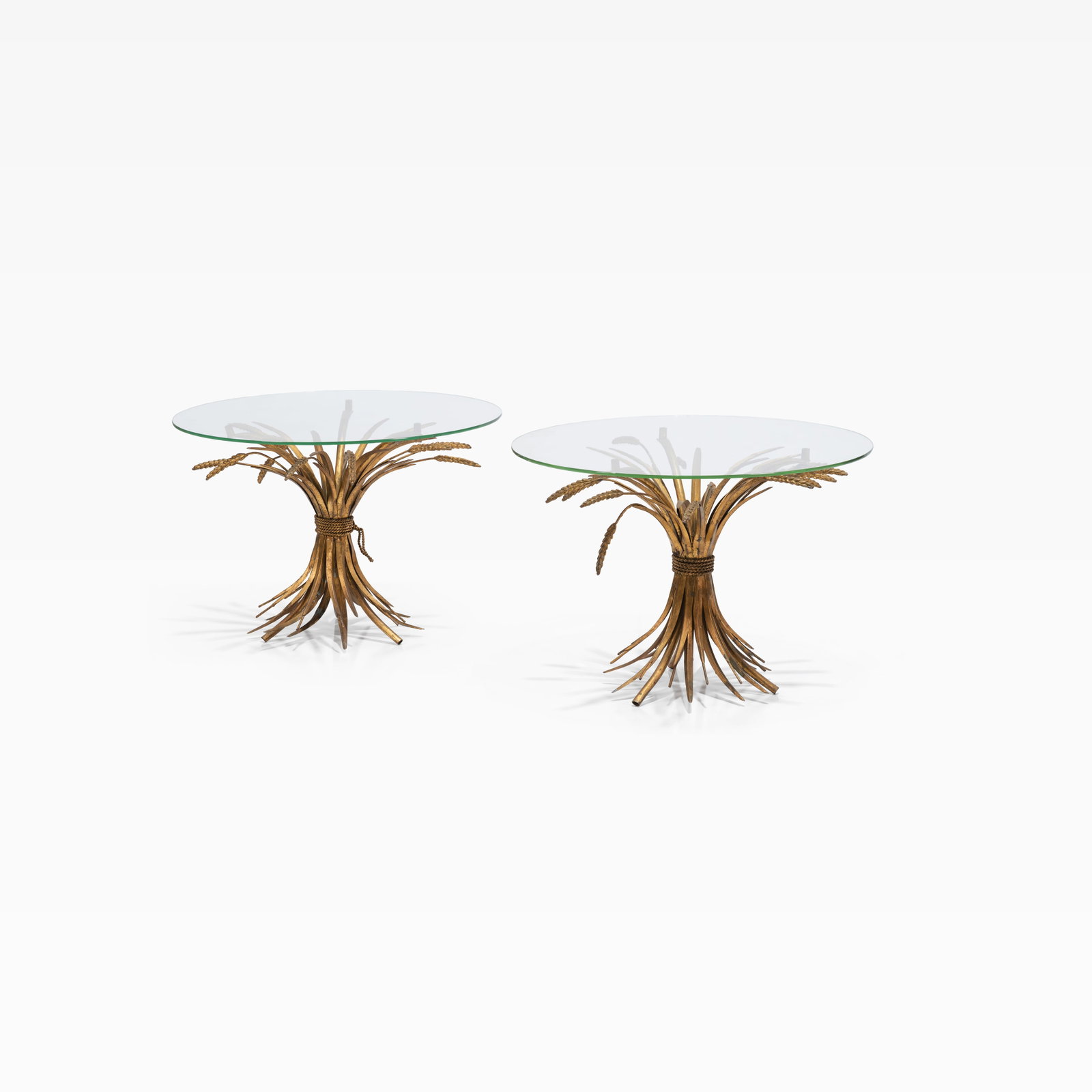 Sheaf of Wheat Tables: A pair of gilt metal and glass sheaf of wheat tables. All measurements are in inches. Height x Width x Depth