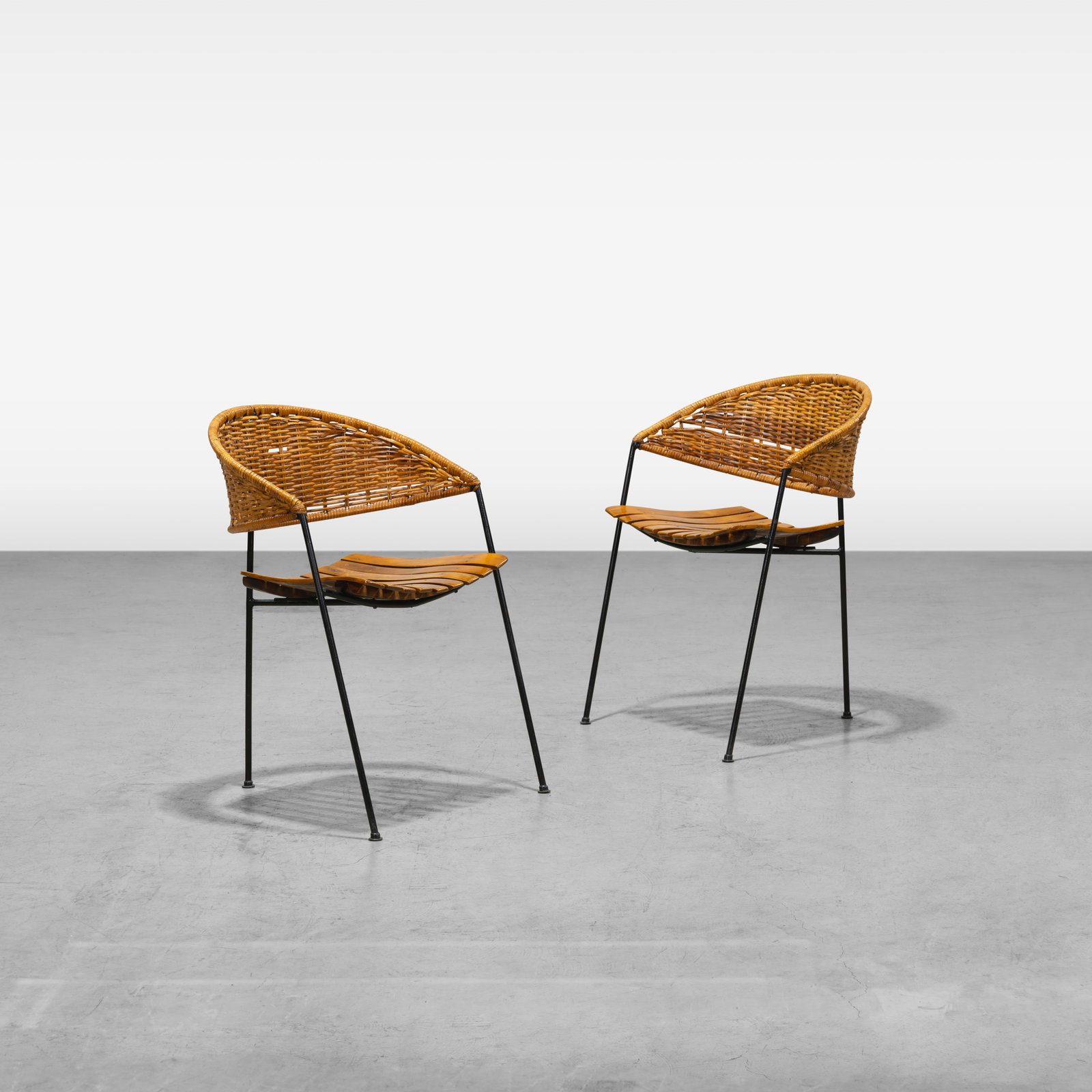 Arthur Umanoff - Chairs: A pair of three legged chairs by Arthur Umanoff. All measurements are in inches. Height x Width x Depth