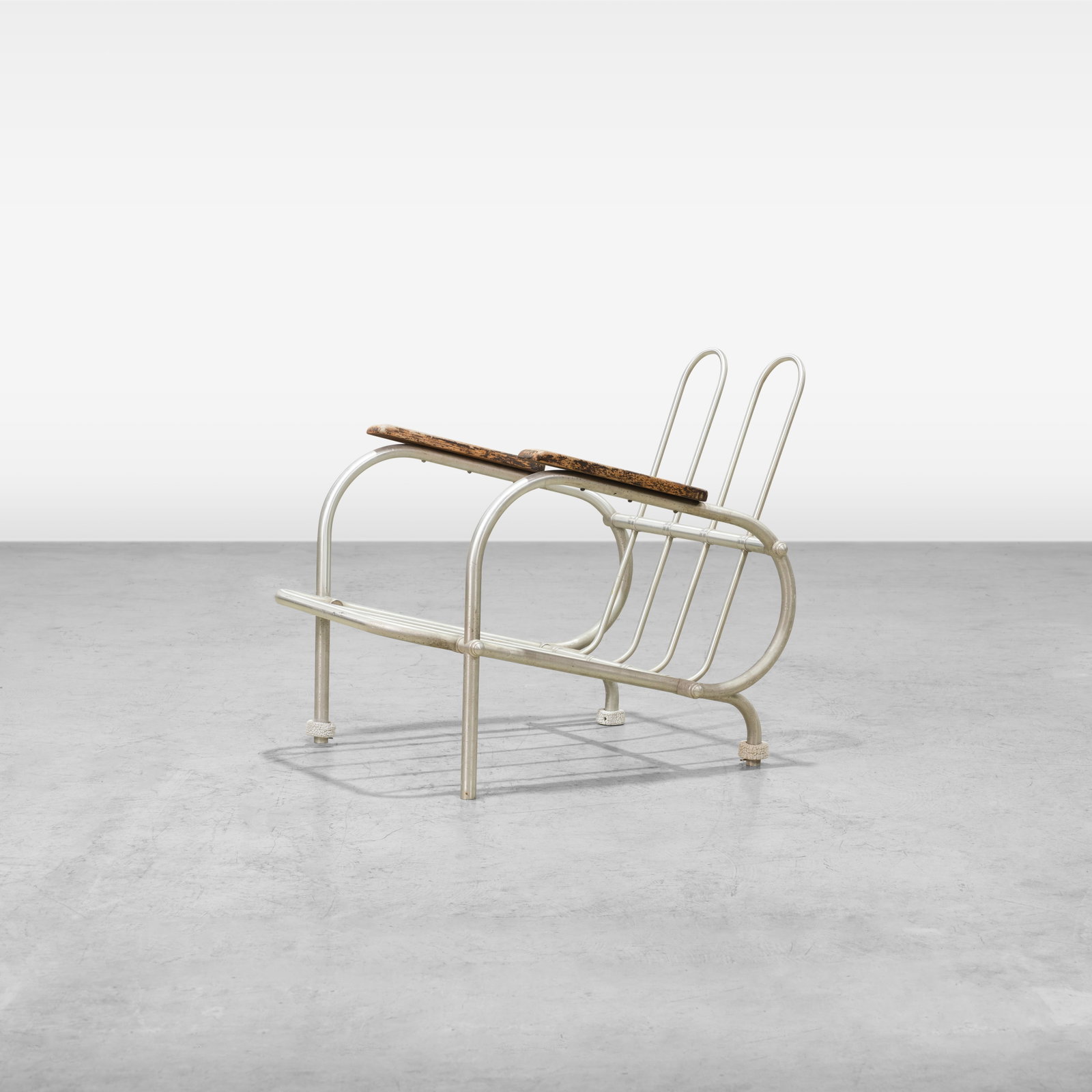 Warren McArthur - Chair Frame: An aluminum chair frame by Warren McArthur. All measurements are in inches. Height x Width x Depth