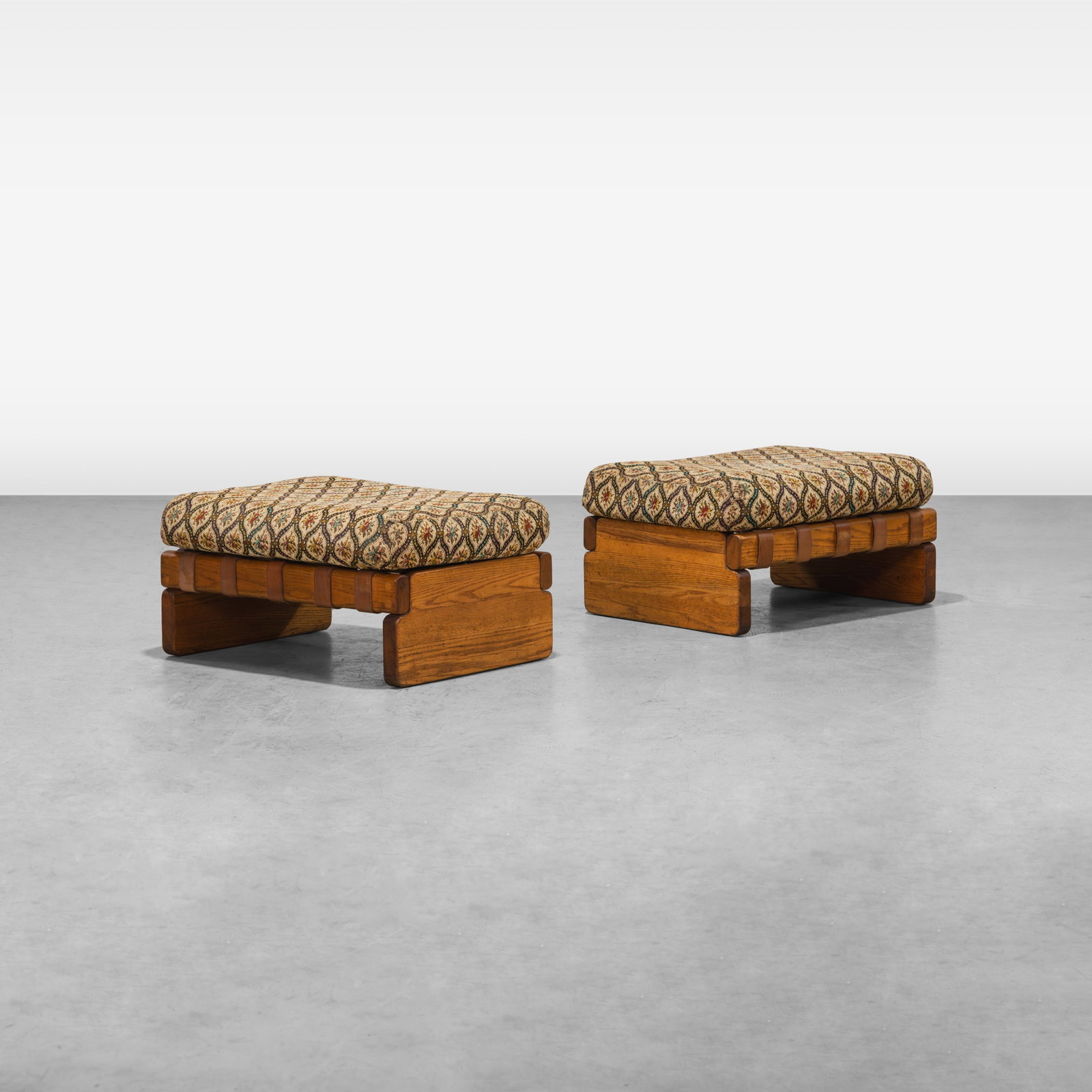 Oak & Leather Strap Ottomans: A pair of oak and leather strap ottomans. All measurements are in inches. Height x Width x Depth