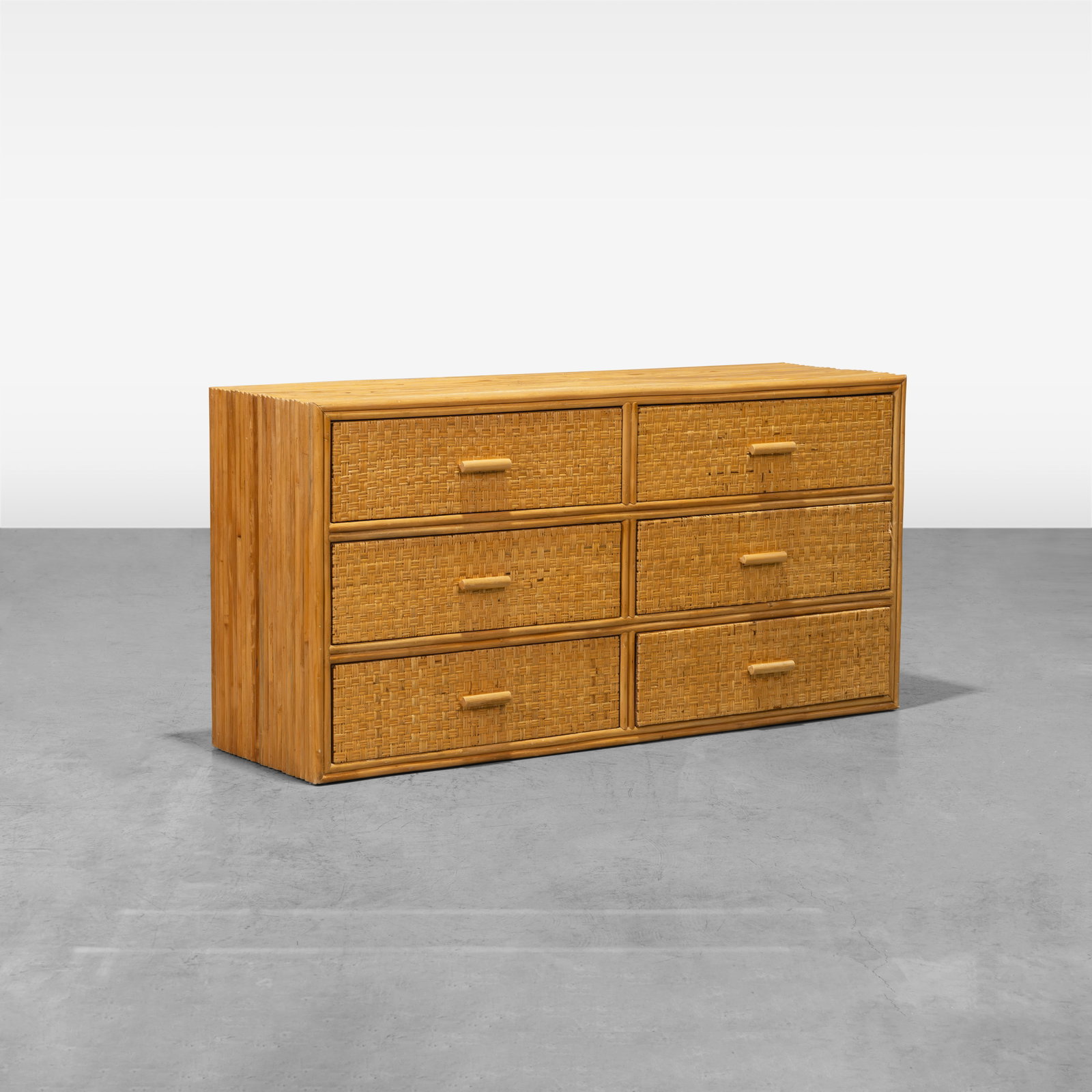Rattan Dresser: A rattan dresser with woven cane doors. All measurements are in inches. Height x Width x Depth