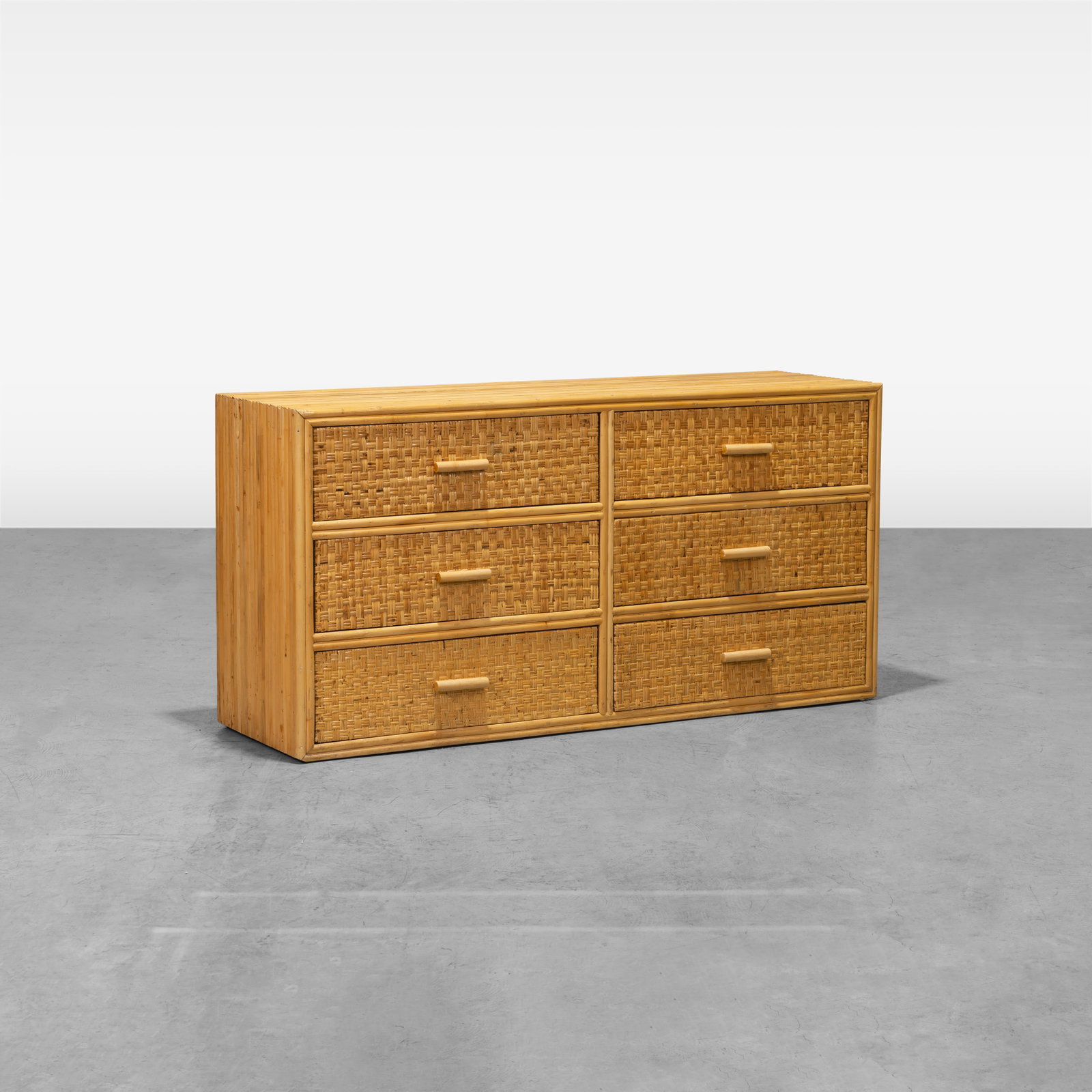 Rattan Dresser: A rattan dresser with woven cane doors. All measurements are in inches. Height x Width x Depth