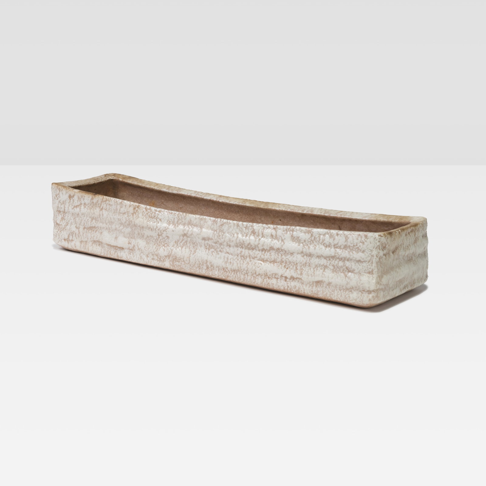Stoneware Planter: A vintage stoneware pottery planter with stamp on bottom. All measurements are in inches. Height x Width x Depth
