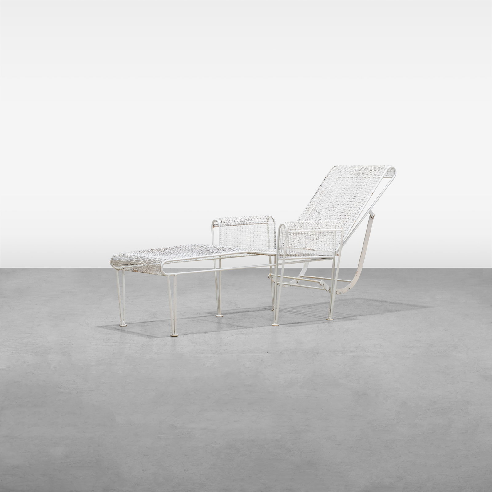 Russell Woodard (Attr.) - Chaise Lounge: An iron chaise lounge with adjustable backrest, attributed to Russell Woodard. Dimensions listed are for the chaise in its pictured position. All measurements are in inches. Height x Width x Depth
