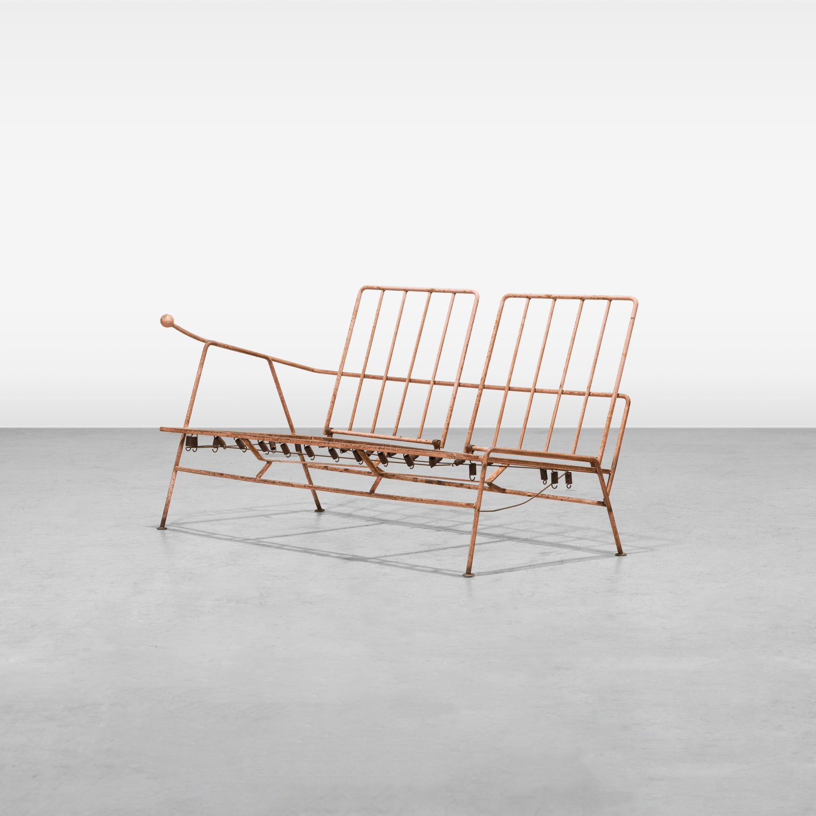 Pink Loveseat: A vintage modernist iron settee. All measurements are in inches. Height x Width x Depth