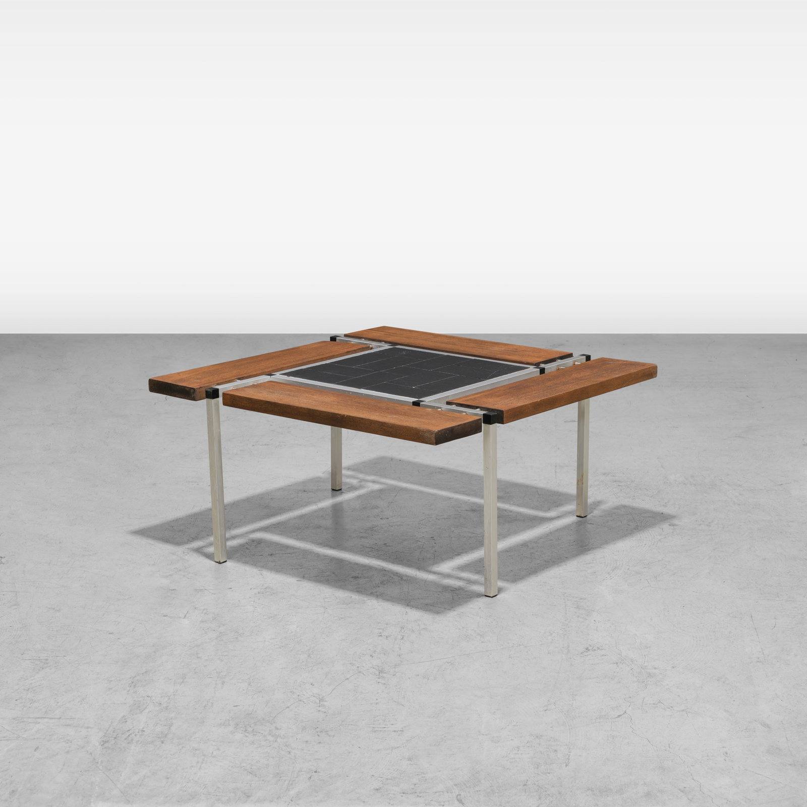 Fabricius & Kastholm Style Coffee Table: A vintage coffee table in the manner of Preben Fabricius and Jorgen Kastholm. All measurements are in inches. Height x Width x Depth
