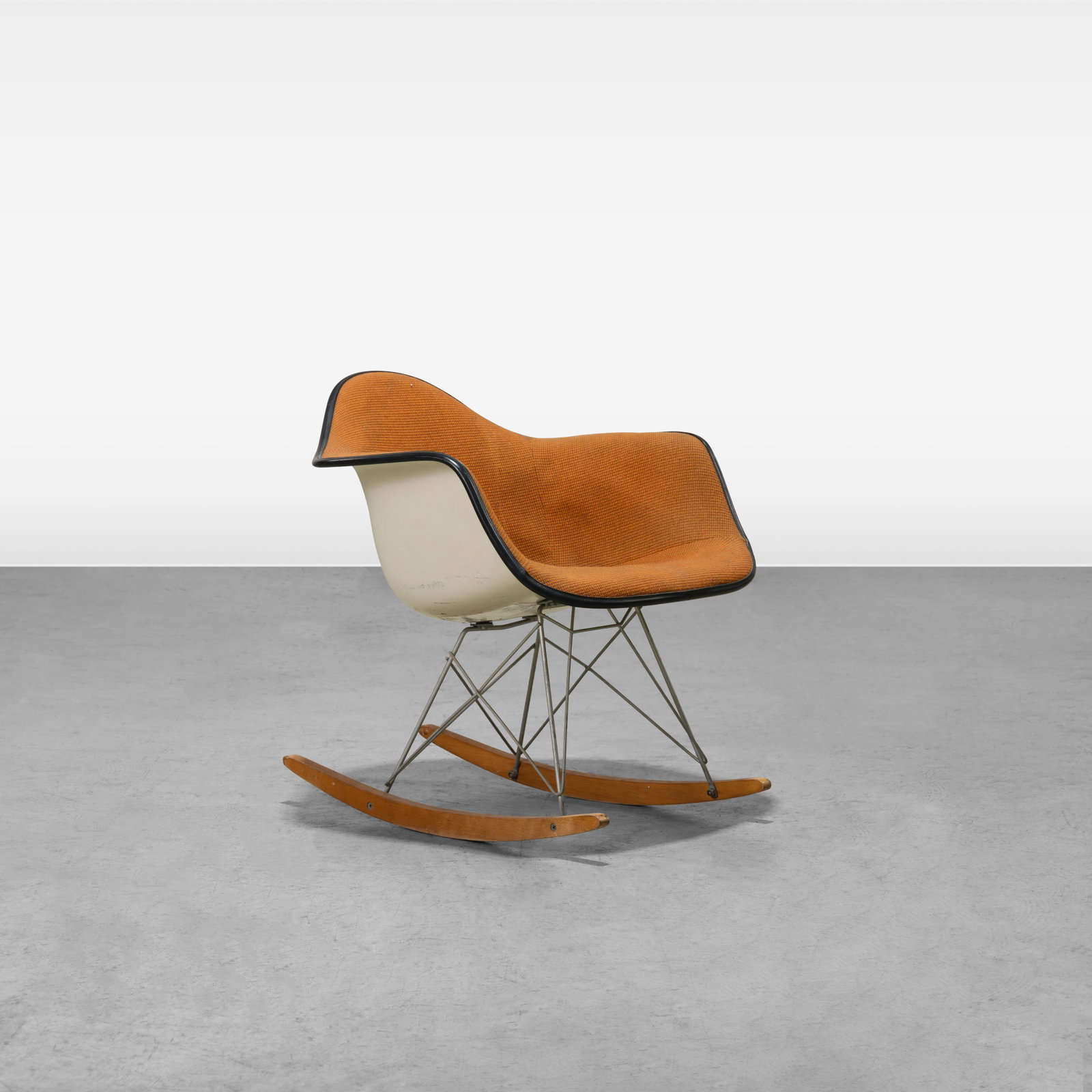 Charles & Ray Eames - RAR: A vintage RAR rocking chair by Charles and Ray Eames Herman Miller. Plaque on backrest. All measurements are in inches. Height x Width x Depth