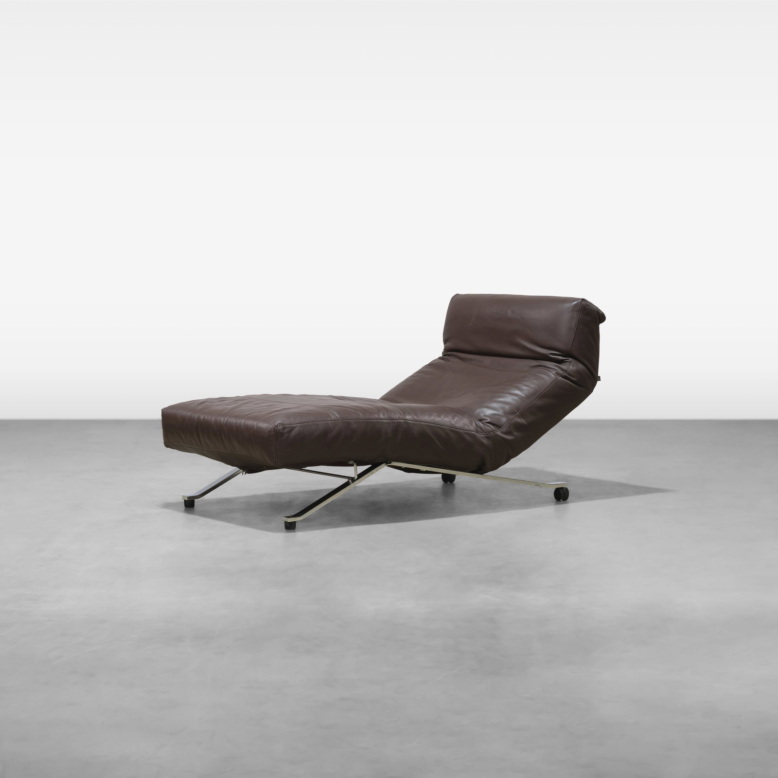 Jens Juul Eilersen - Leather Chaise: A leather chaise lounge with adjustable backrest by Jens Juul Eilersen. All measurements are in inches. Height x Width x Depth