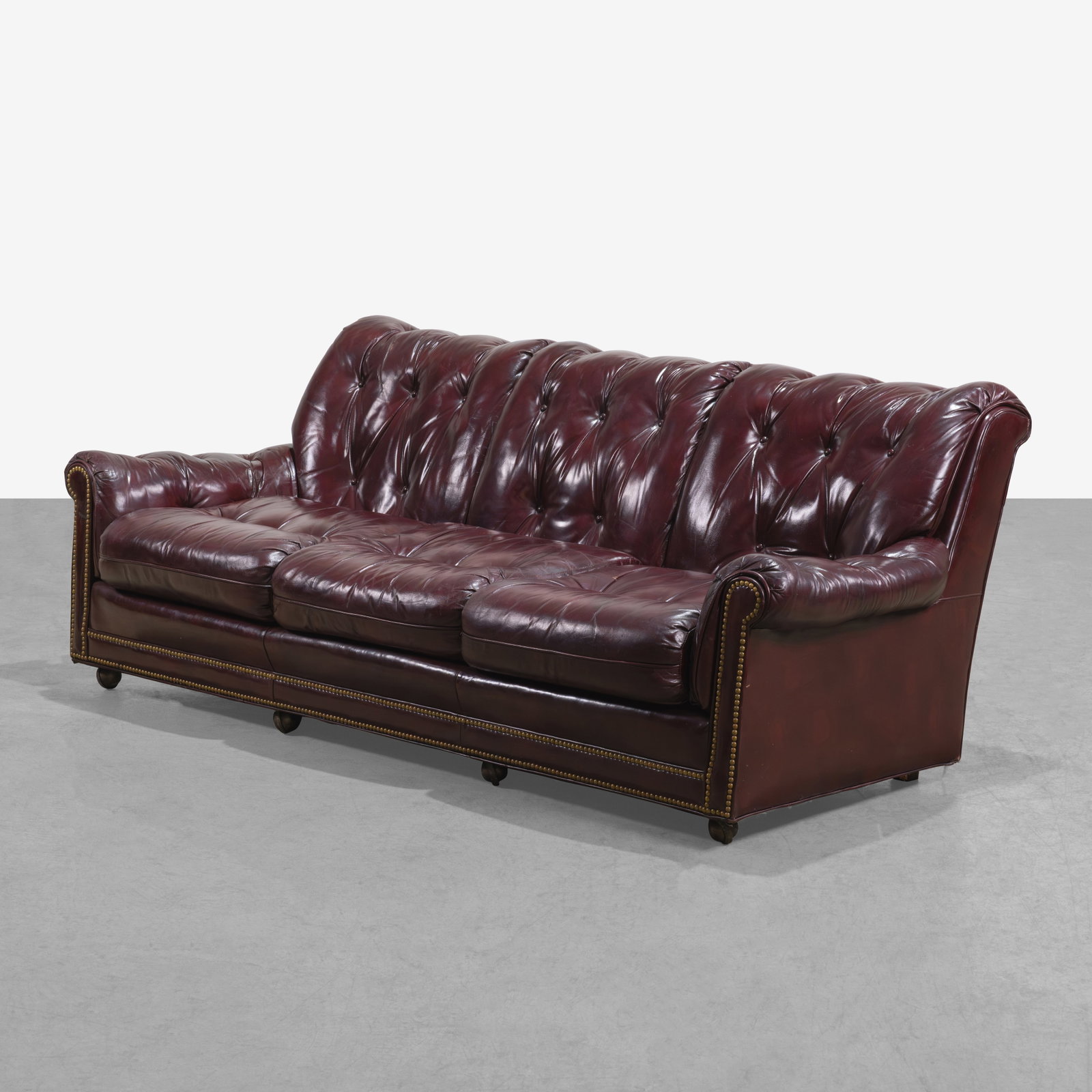 Hancock & Moore - Leather Sofa: A vintage leather three-seat sofa by Hancock & Moore. All measurements are in inches. Height x Width x Depth