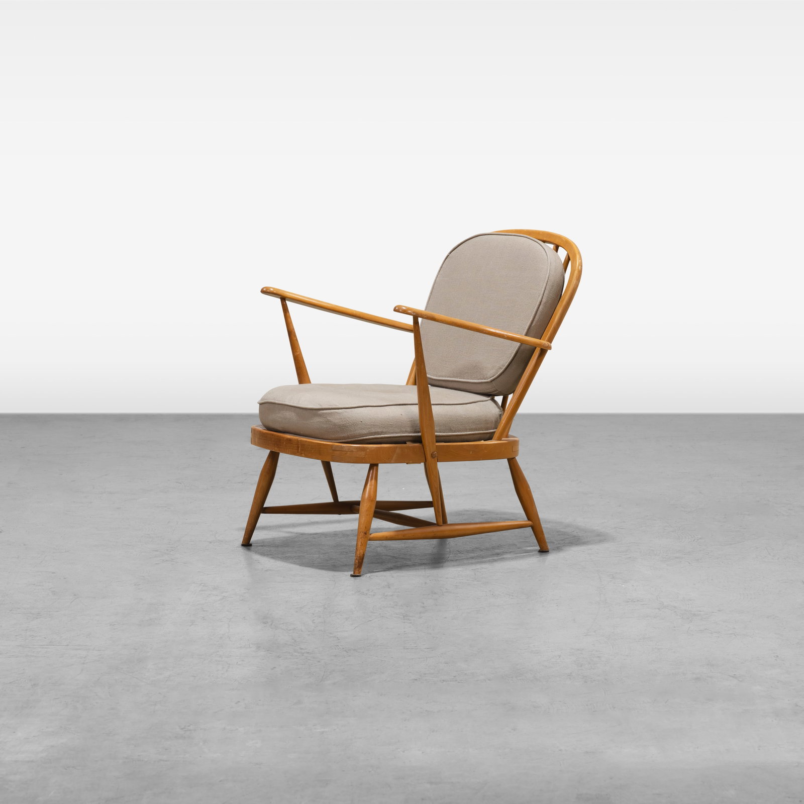 Lucian Ercolani - Lounge Chair: A lounge chair by Lucian Ercolani for Ercol. All measurements are in inches. Height x Width x Depth