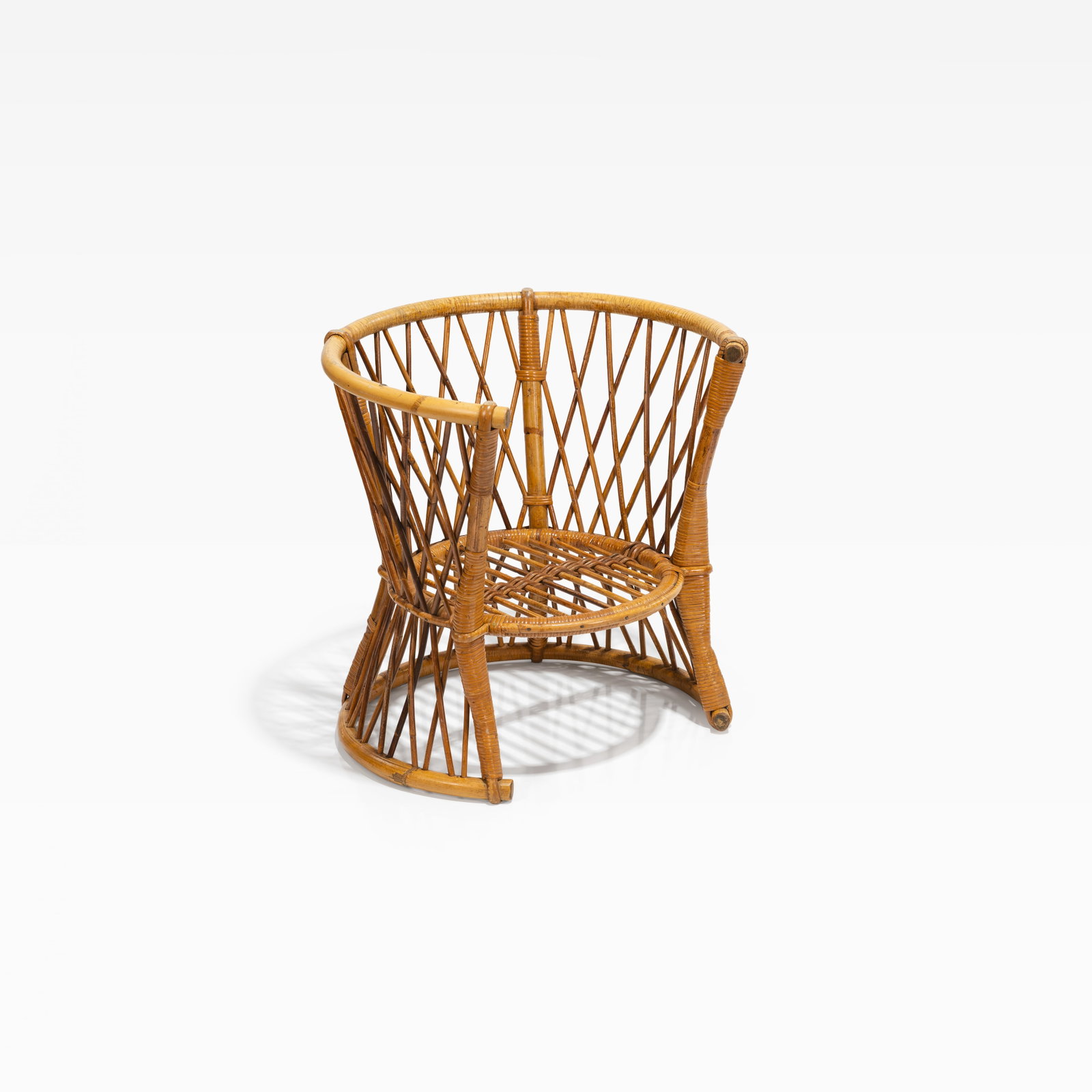 Rattan Child's Chair: A vintage rattan child's chair. All measurements are in inches. Height x Width x Depth