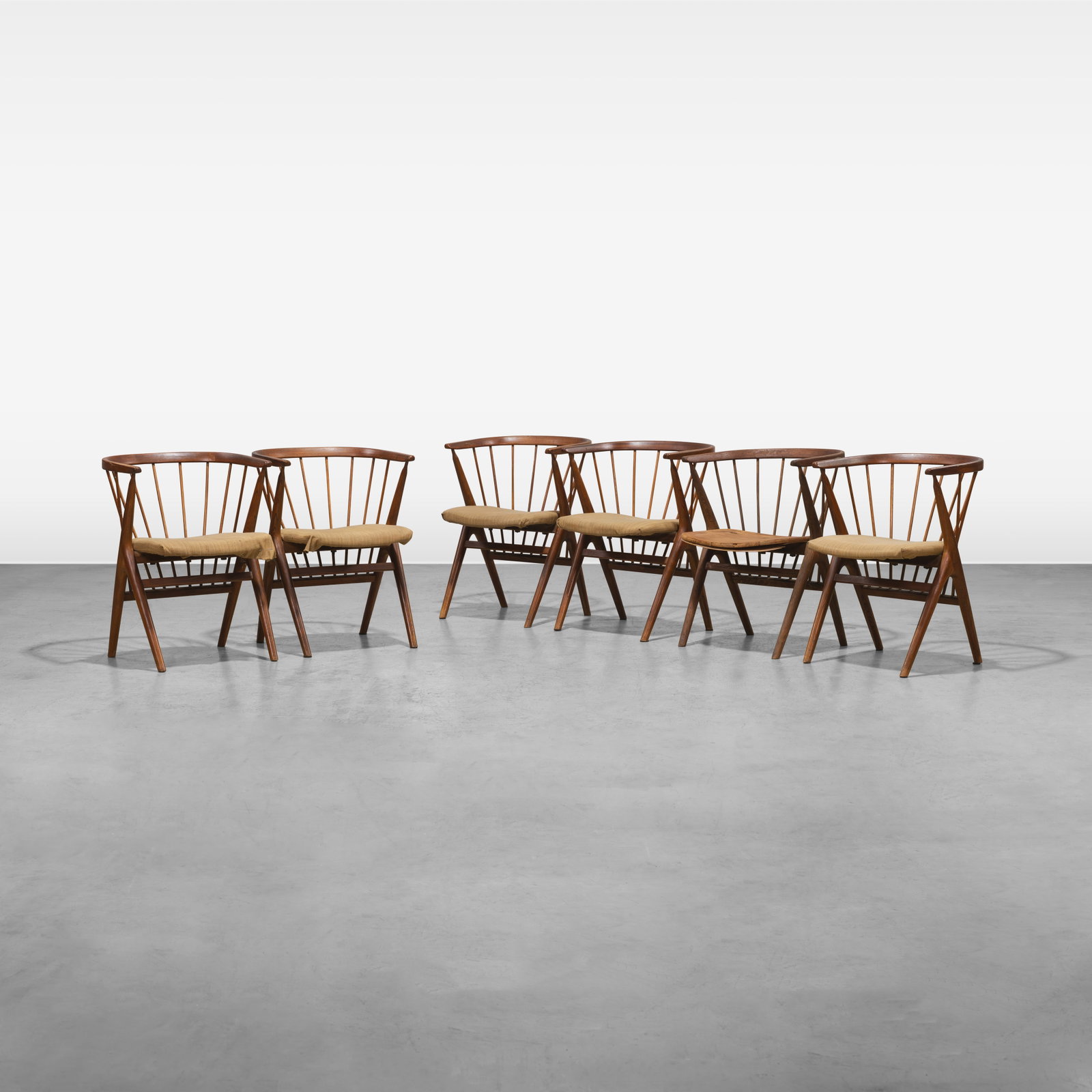 Swedish Dining Chairs: A set of six oak spindle-back dining chairs by Helge Sibast. All measurements are in inches. Height x Width x Depth