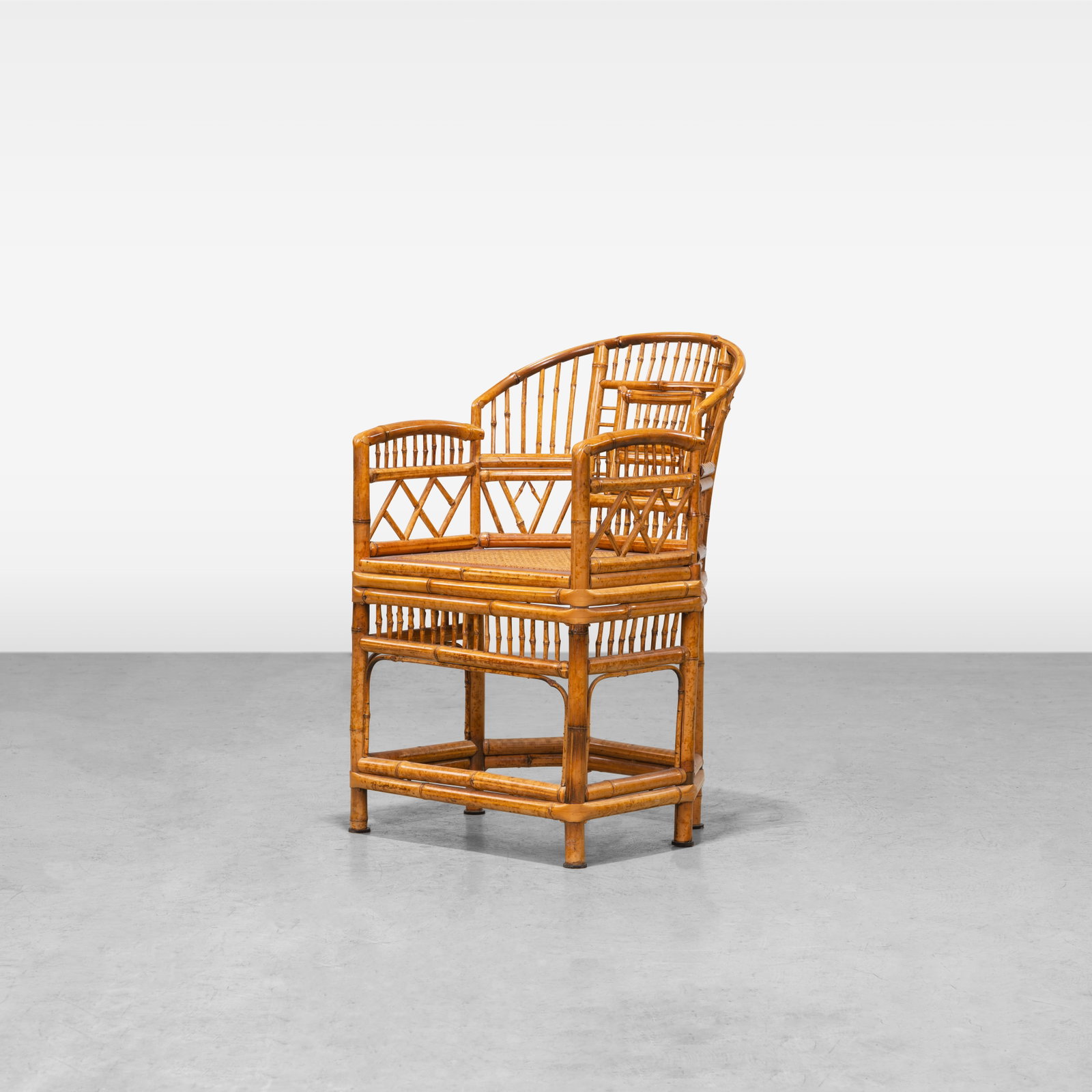 Rattan Arm Chair: A vintage rattan armchair. All measurements are in inches. Height x Width x Depth