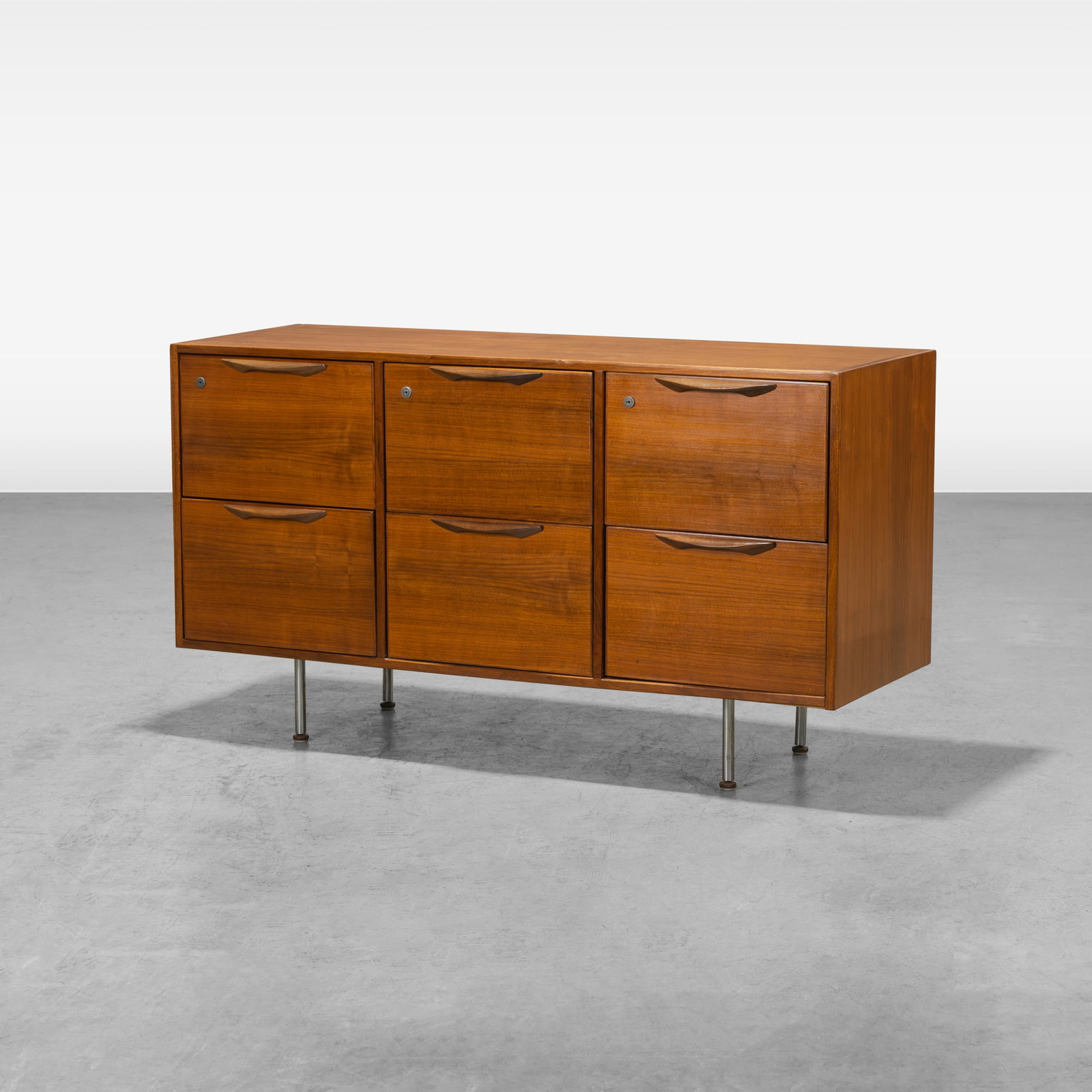 Jens Risom - Credenza: A vintage office credenza by Jens Risom with finished back All measurements are in inches. Height x Width x Depth