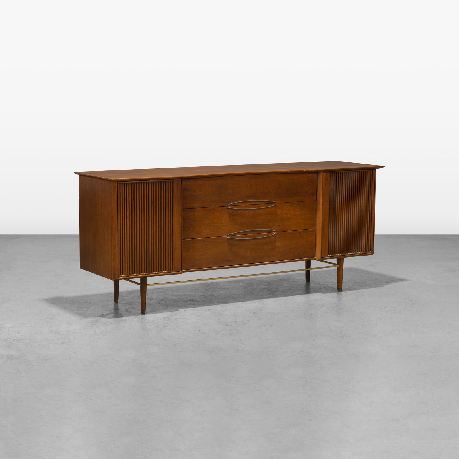 Helen & Hobey Baker - Walnut Dresser: A walnut dresser by Helen and Hobey Baker for Helen Hobey Baker. All measurements are in inches. Height x Width x Depth