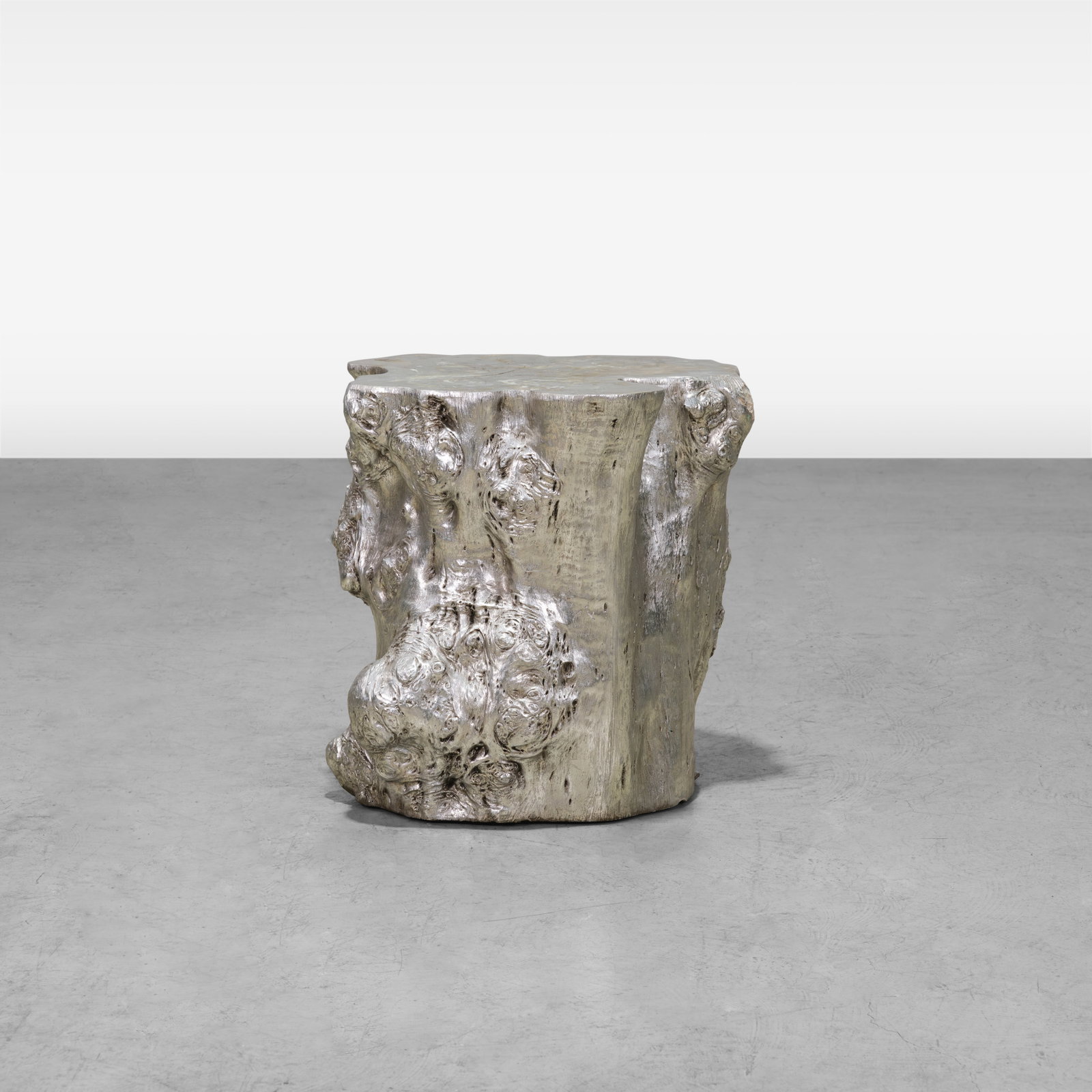 Silvered Faux Bois Table: A silvered faux wood table. All measurements are in inches. Height x Width x Depth