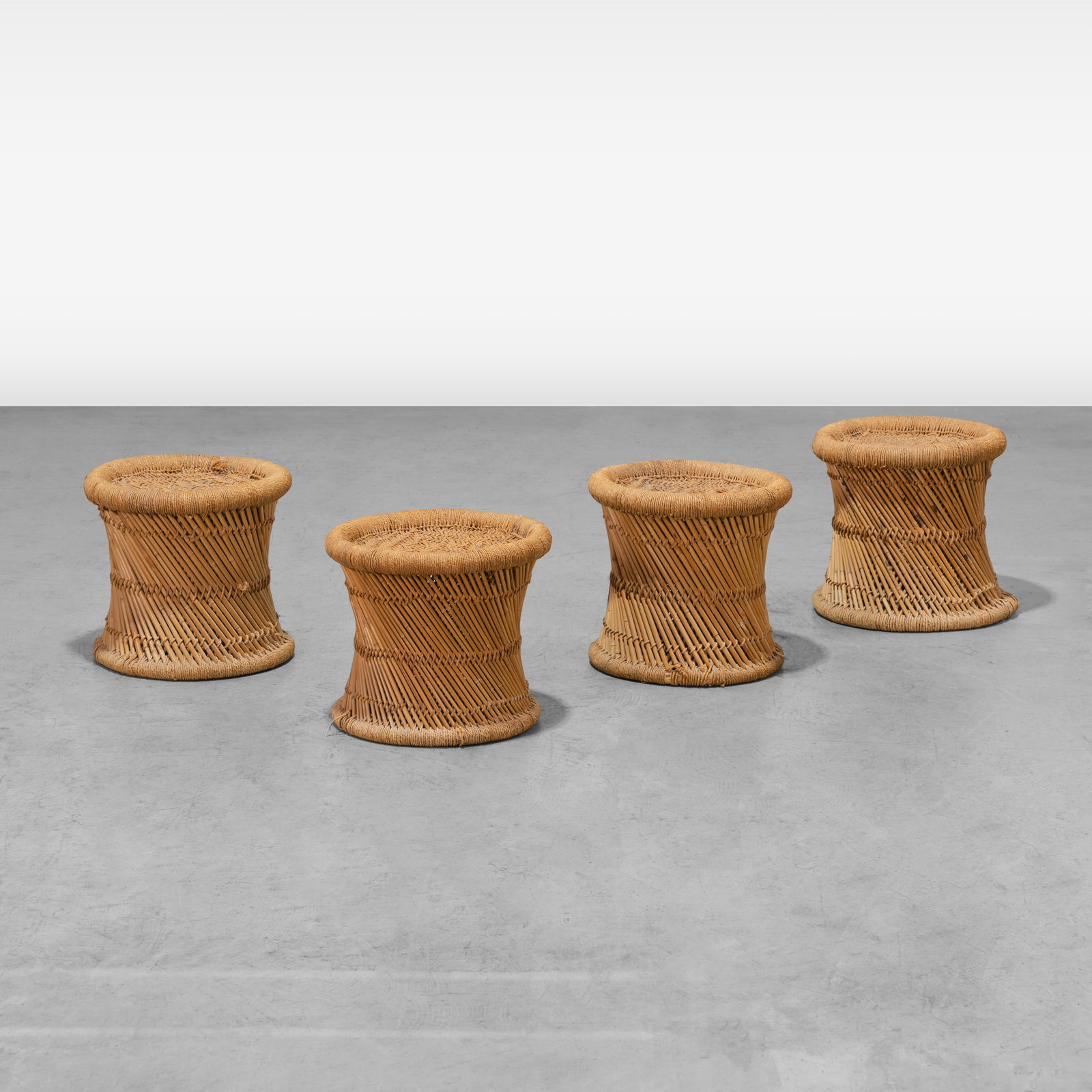 Rattan Stools: A set of four rattan and rope stools. All measurements are in inches. Height x Width x Depth