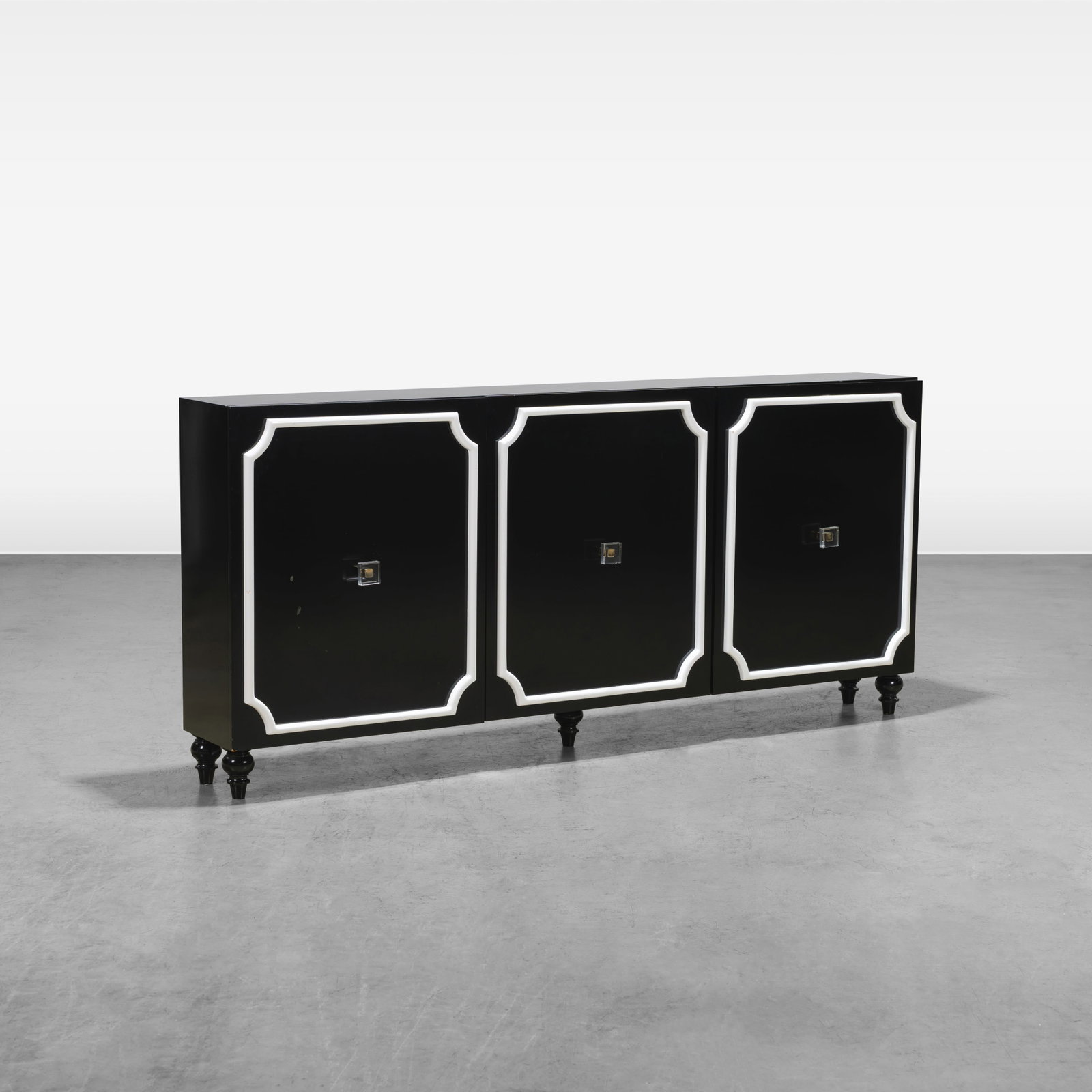Contemporary Lacquered Credenza: A black lacquered contemporary credenza. Each door contains two adjustable shelves. All measurements are in inches. Height x Width x Depth