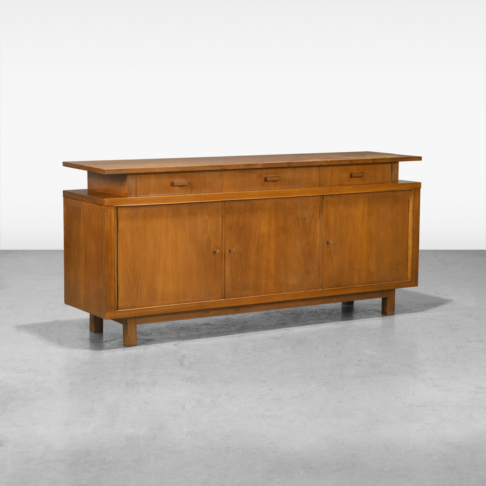 T. H. Robsjohn-Gibbings - Saridis of Athens Buffet: A vintage Saridis buffet / credenza by T. H. Robsjohn-Gibbings for Saridis of Athens, Greece. All measurements are in inches. Height x Width x Depth
