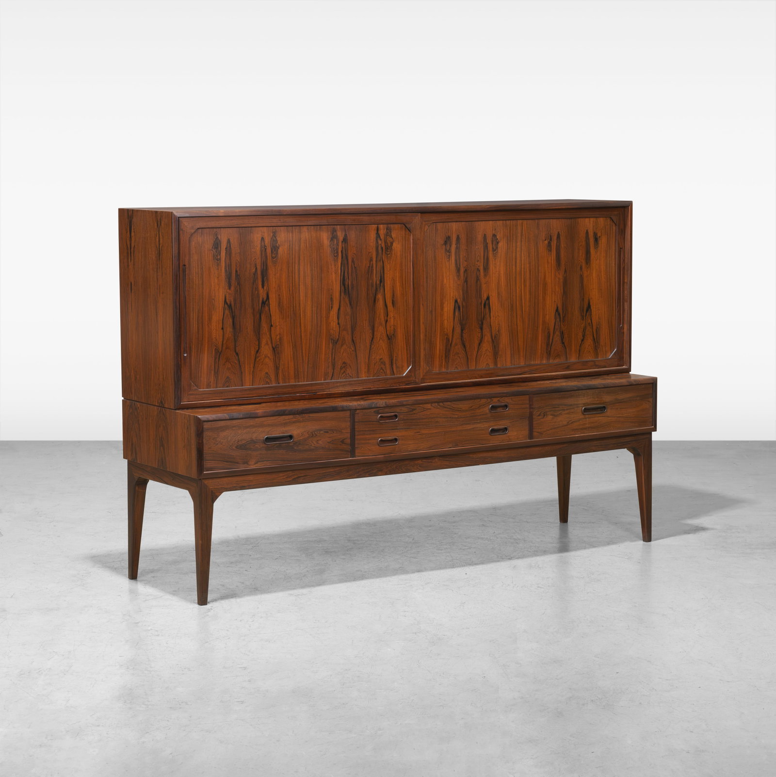 Kai Kristiansen - Highboard: A rosewood highboard, Model 54, by Kai Kristiansen for Schou Andersen. All measurements are in inches. Height x Width x Depth