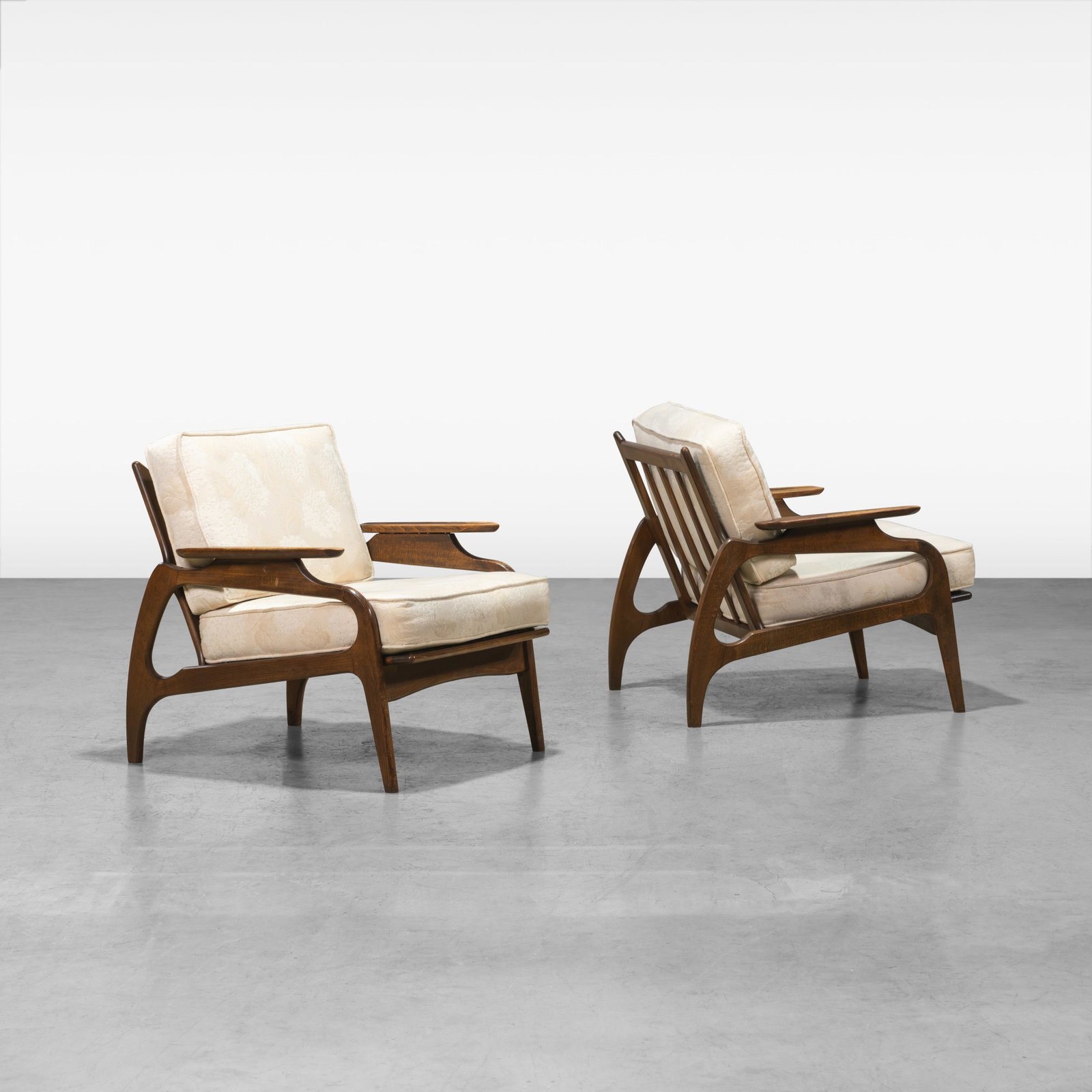 Adrian Pearsall - Lounge Chairs: A pair of vintage paddle arm lounge chairs by Adrian Pearsall for Craft Associates. All measurements are in inches. Height x Width x Depth