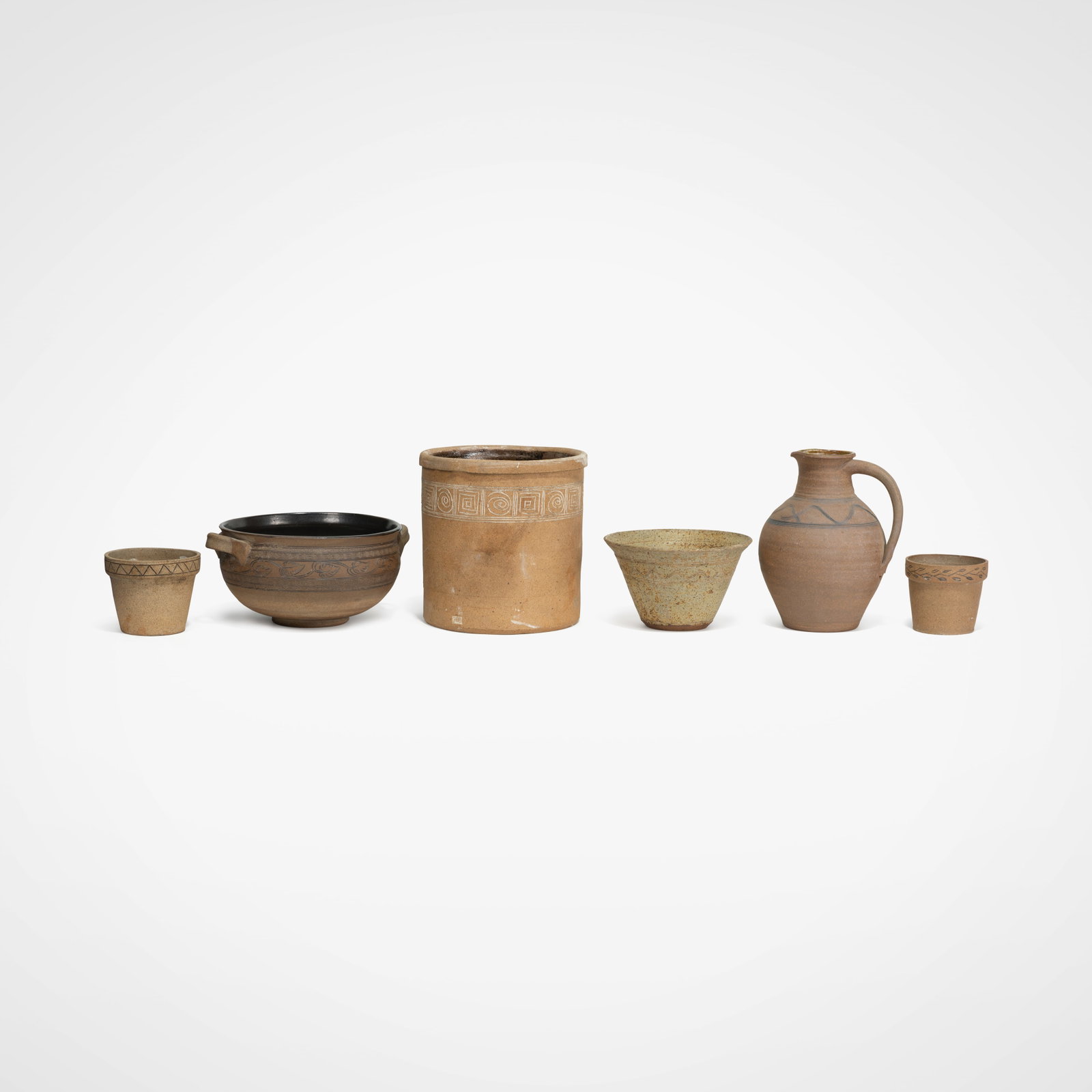 Herbert Sargent - Studio Pottery Group: A six piece studio pottery group in various styles by Herbert Sargent. Stamped H S on bottom. Dimensions listed are for the largest vessel. All measurements are in inches. Height x Width x Depth