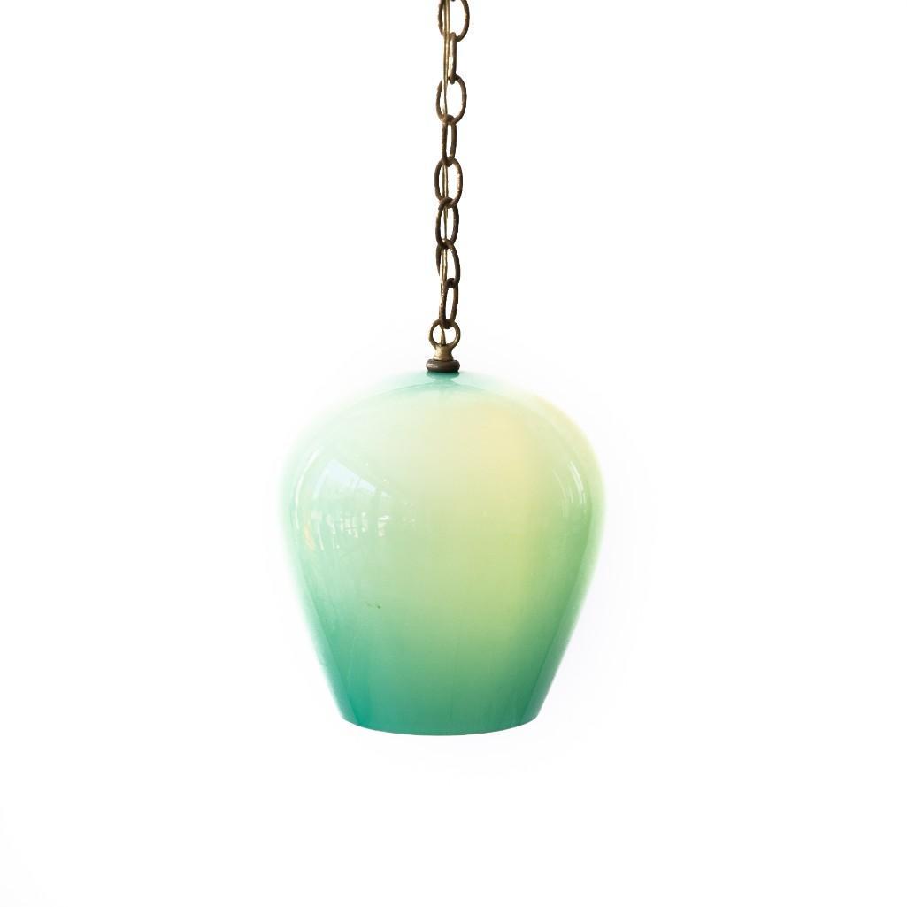 Mid Century Modern Massimo Vignelli For Venini Hanging: Massimo Vignelli for Venini Italian Mid-century modern cased glass blue-green pendant, holds one bulb. Lamp: 11" H x 10" D; on chain: 48" L.