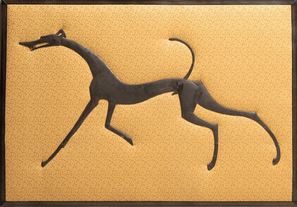 William Hunt Diederich Repousse Sculpted Greyhound: Monumental William Hunt Diederich large hand wrought and formed iron Circa 1920 repousse sculpted greyhound dog on a gold fabric background mounted on wood. 42" x 60" Artist and designer Hunt Diederic