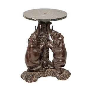 Century Asian Japanese Carved Hardwood and Marble: Asian Japanese finely carved hardwood marble top table. The green marble top supported by 3 finely carved elephants. Early 20th century. Condition: The very tip of one elephant's trunk is missing