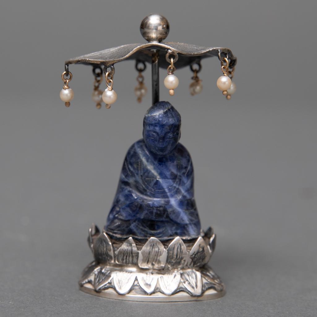 chinese hardstone figure of a deity seated on a otus (1 of 5)