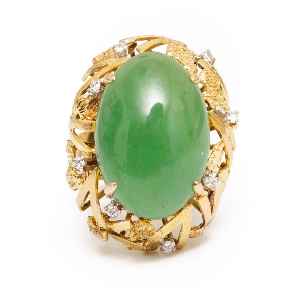 18K Gold, Diamond and Nephrite Ring: 18k gold ring set with one oval nephrite ap. 20.3 x 13.8 mm., small single-cut diamonds, approx. 7.1 dwt