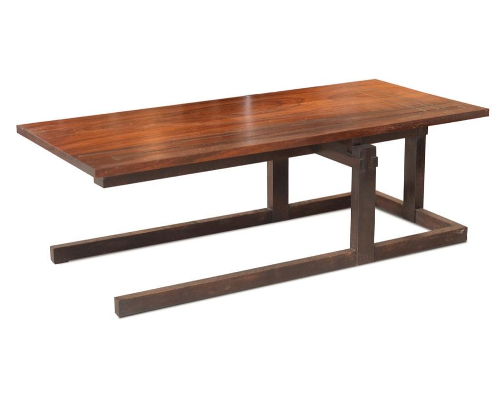 20th Century Thomas Swift Studio Cantilever: Thomas Swift Studio Cantilever Architectural Designed and Incised Decorated Teak Low Table Circa 1980. This table is take on the Frank Loyd Wright visual aesthetic. It has teak cantilevered top clever