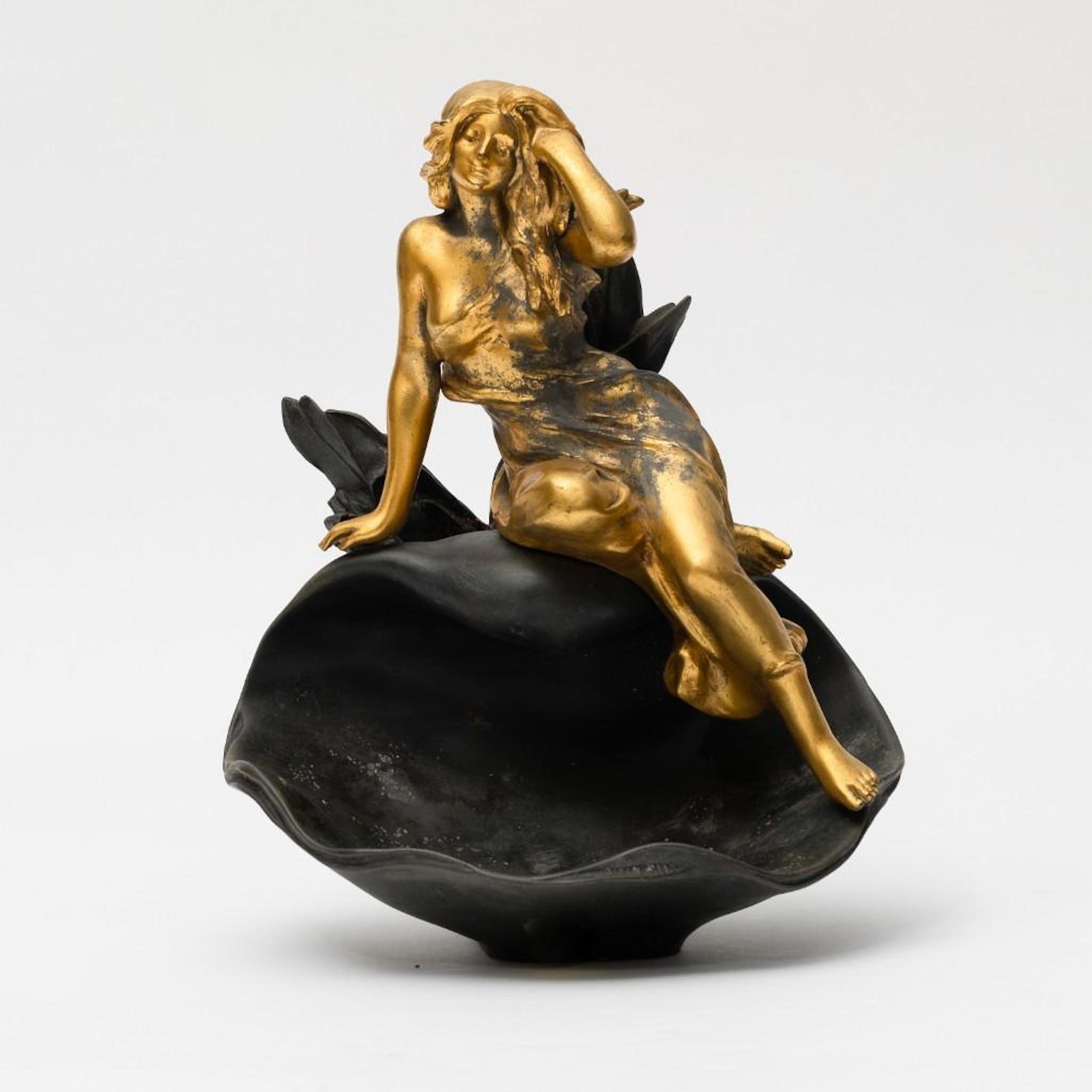 Julian Causse Signed Sculpture: Julian Causse Signed Sculpture late 19th century, gilded nymph on a dark green finish shell with aquatic plants, marked "J. Causse" on shell, Measures 12"h x 10"W overall good condition