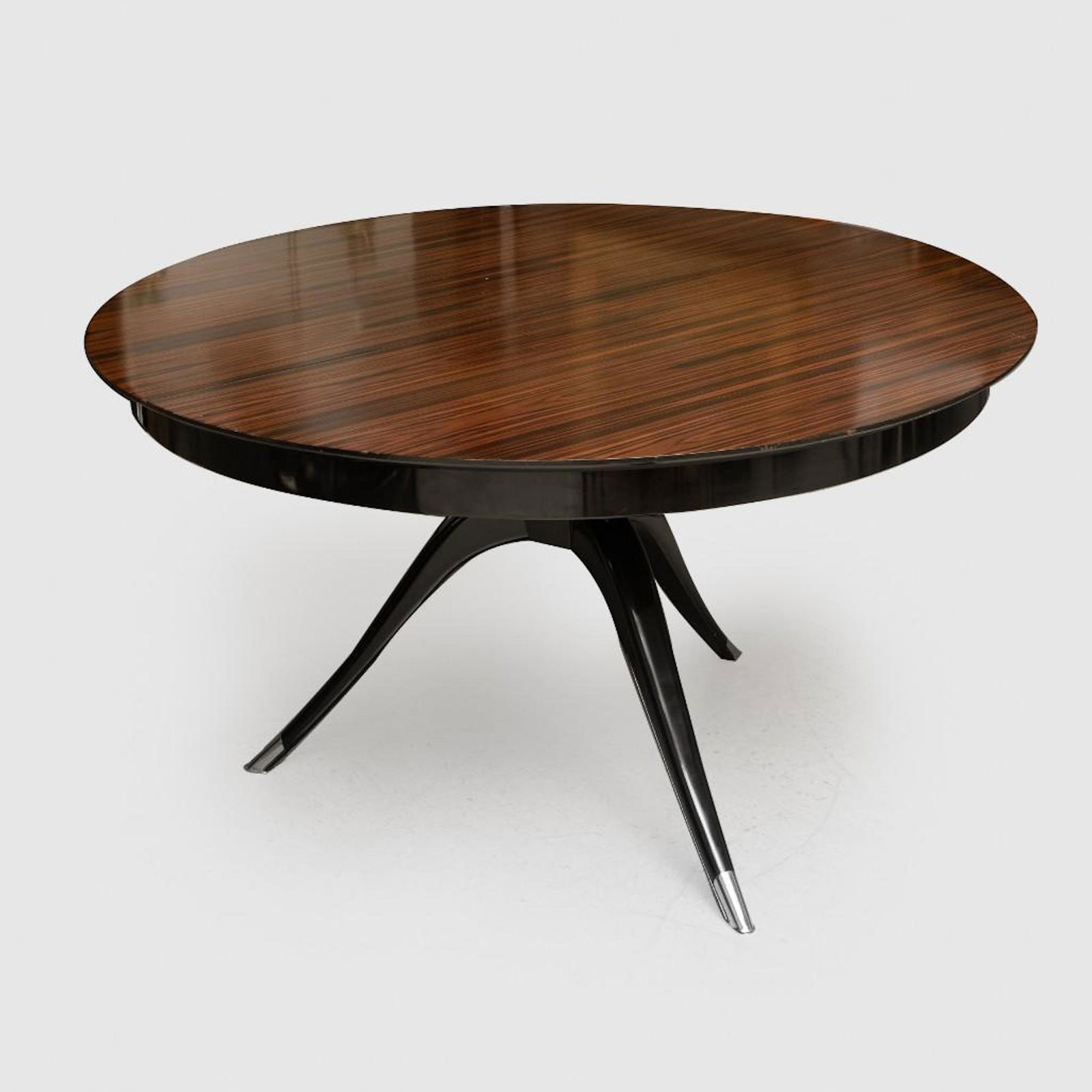 Italian Rosewood and Ebonized Extension Dining Table: Italian Rosewood and Ebonized Extension Dining Table, in the Manner of Ruhlmann Fitted with one leaf it measures 30 x 4 ft. 6 in. x 6 ft. 4 in. (has extension leaves that do have some damages to finis