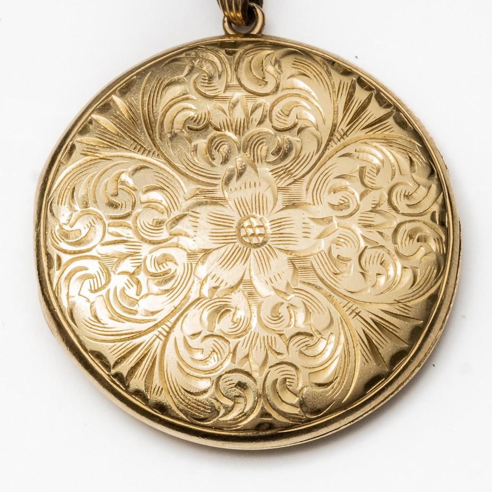 14K Gold Locket: 14K Gold Locket. 5.8grams. Measures 28.2mm in diameter