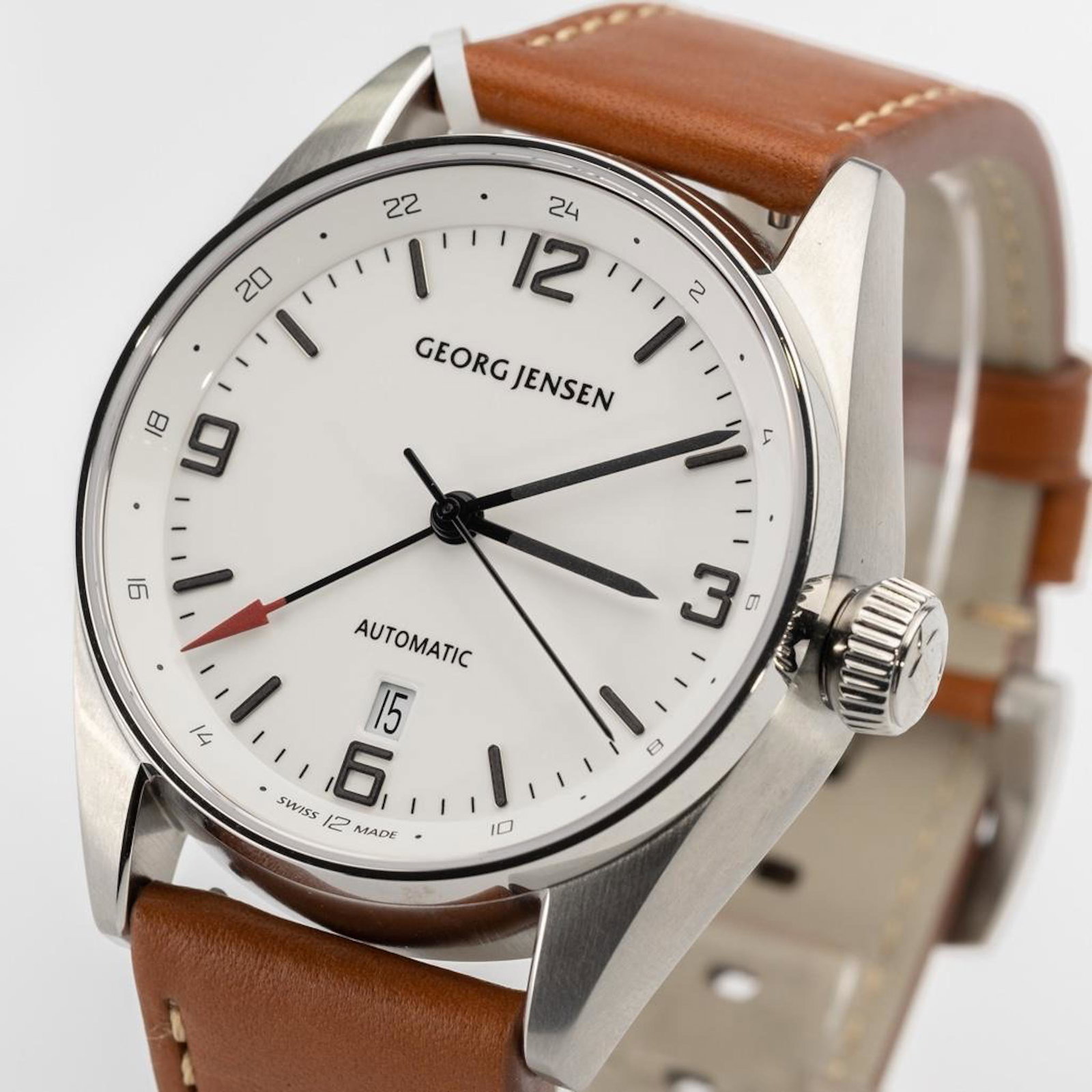 George Jensen Delta GMT Automatic Watch NEW: Georg Jensen Delta GMT automatic watch, Brand New..featuring full size brown leather band with GJ buckle. White dial with black markers, center second hand. Working order.. Comes with box. Case 42mm.