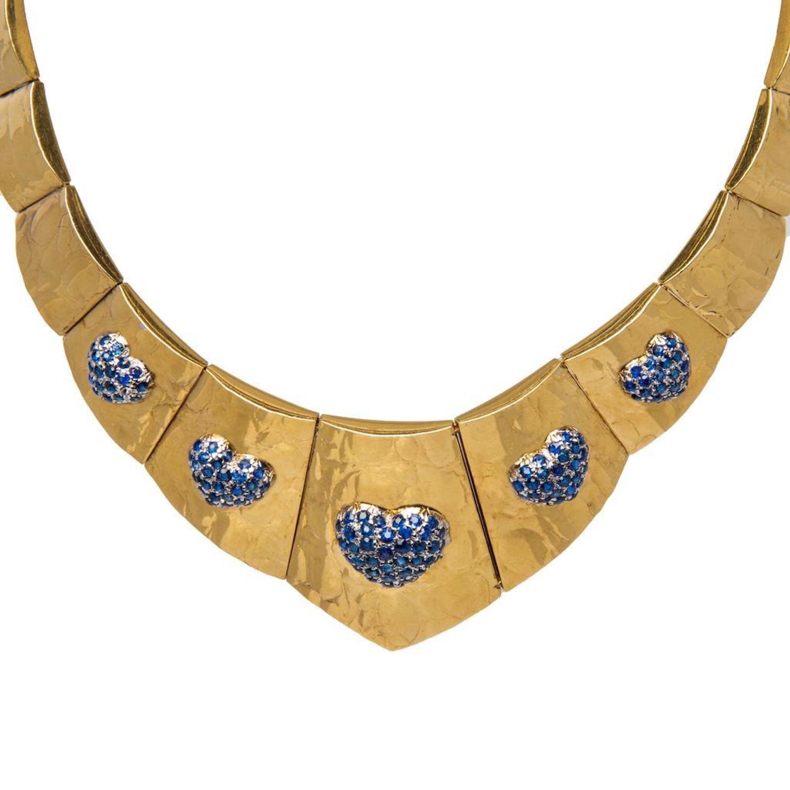 Gucci 18K Yellow Gold and Sapphire Necklace: Authentic Signed Gucci 18k yellow gold necklace by Gucci, set with heart elements with blue sapphires. Necklace is approx. 15 inches. Weigns 92.8 grams approx. In good condition