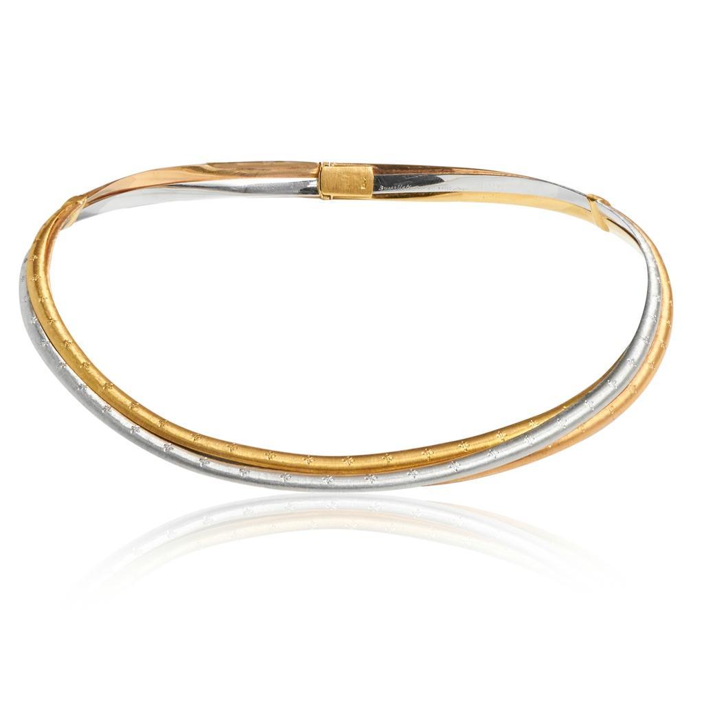 18kt BuccellatiÃ‚ signed tri-color gold hinged choker: 18kt BuccellatiAUTHENTIC signed tri-color gold hinged choker. Three woven strands of rose, white and yellow gold. Hinged in center on each side. Box clasp. Stamped Buccellati, Italy and 18K. Outside c