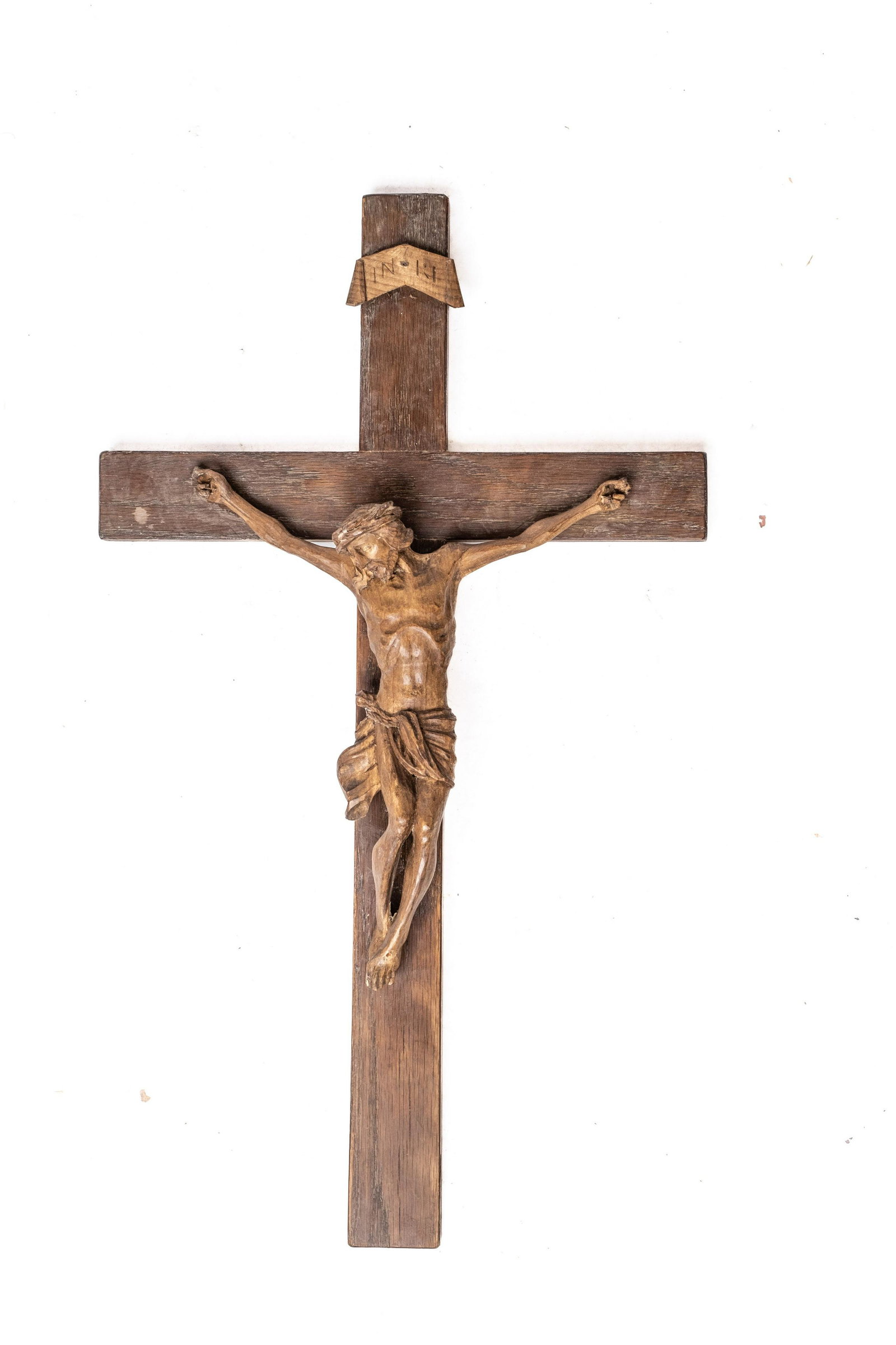 Large Antique Hand-Carved Wooden Crossed: Large Antique Hand-Carved Wooden CrossedLarge Fine Hand-Carved Wooden Sculpture depicting Christ on the cross with good patina24" high x 14" Wide Notice to BiddersThe absence of a condition