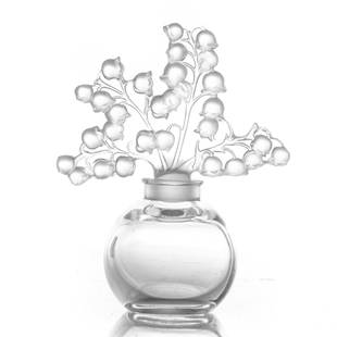 Lalique signed Perfume Bottle: Lalique signed Glass Perfume BottleLalique 'Clairefontaine' clear and frosted crystal perfume bottle. The perfume bottle stopper in the form of a spray of lily of the valley. Marked to underside of ba