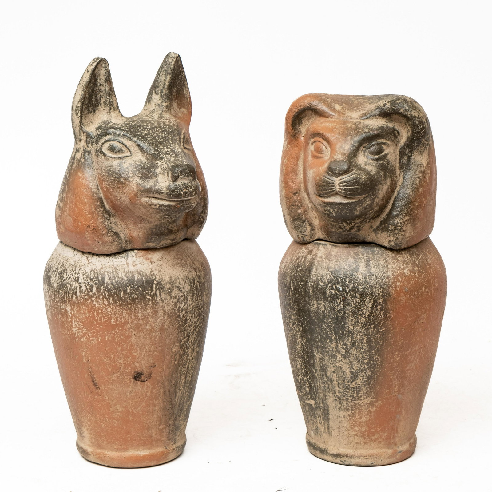 Pair of Antique Egyptian Canopic Jars: Pair of Antique Egyptian Canopic JarsPair of Antique Egyptian Canopic jars. Canopic jars were made to contain the organs that were removed from the body in the process of mummification: the lungs, liv