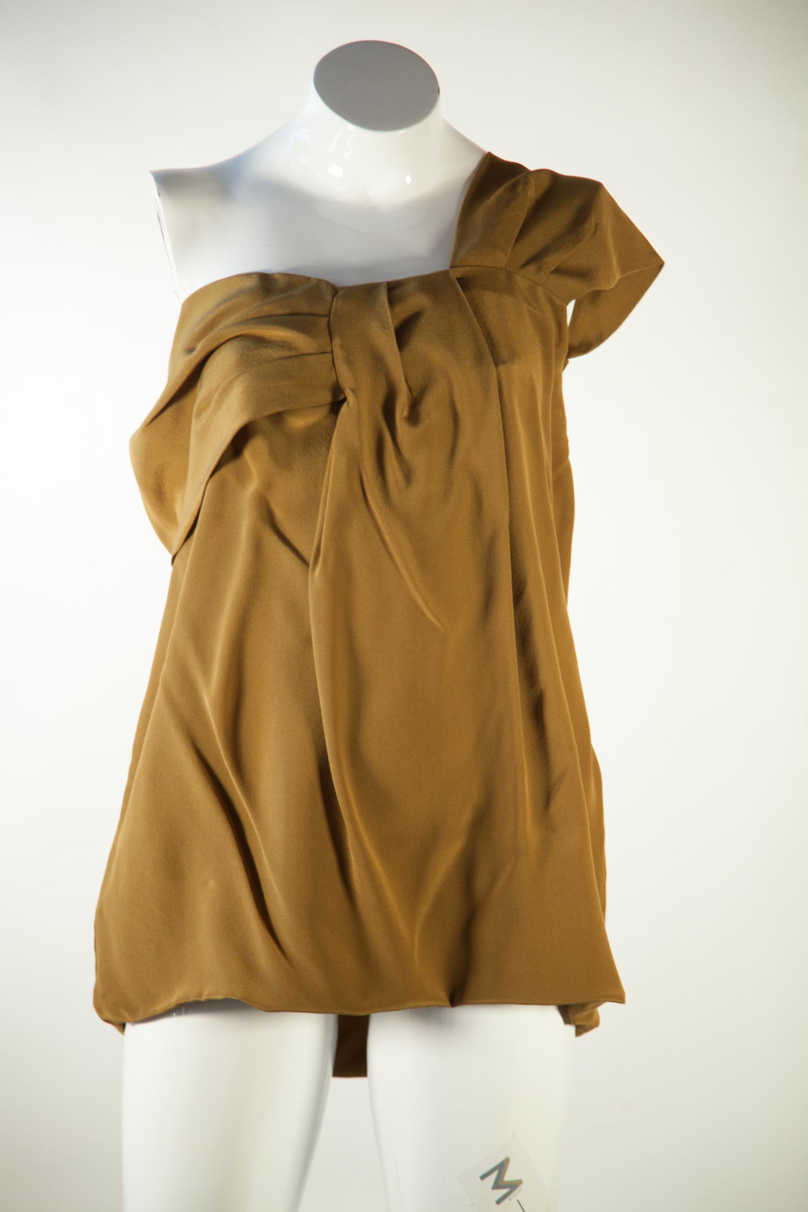 Fendi Silk One Shoulder Tunic: Fendi Silk One Shoulder Tunic Vintage CoutureThis Fendi tunic is perfect for making a bold statement! Crafted with luxurious silk, this one-shoulder design features a vibrant olive green hue. The Sz 3