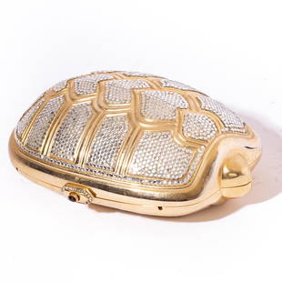 Judith Leiber Turtle Minaudiere: Judith Leiber Turtle formed MinaudiereTurtle minaudiÃ¨re encrusted with clear crystals on a gold-tone metal frame with gold leather lining, a retractable chain strap, and top pressure clasp closure.