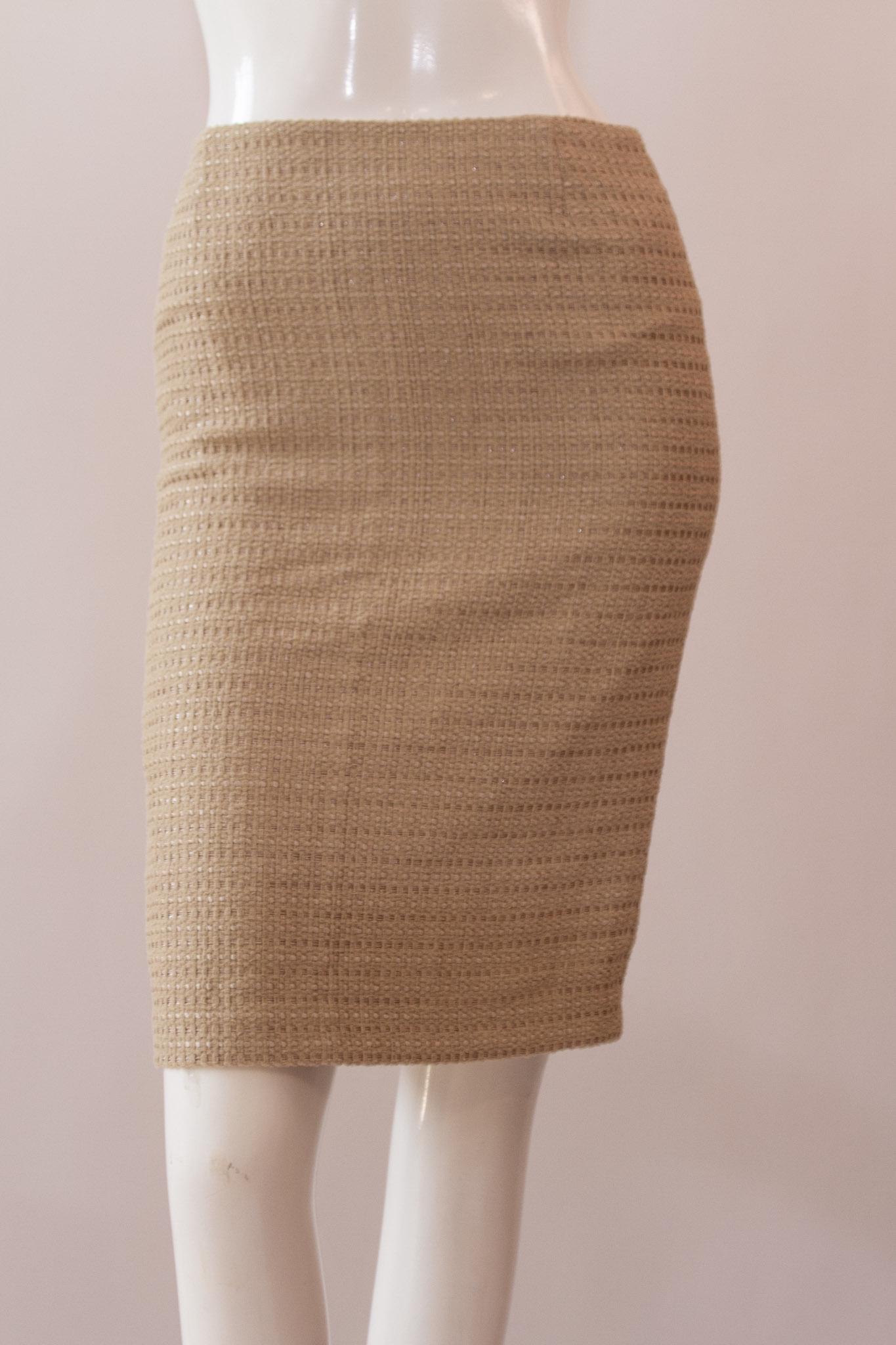 Escada Womens Designer Tan Cotton and Silk Blend Skirt : Size 34: Escada Womens Designer Tan Cotton and Silk Blend Skirt : Size 34This Escada tan skirts features a classic mid-length silhouette and textured fabric for an added touch of sophistication. Crafted with t