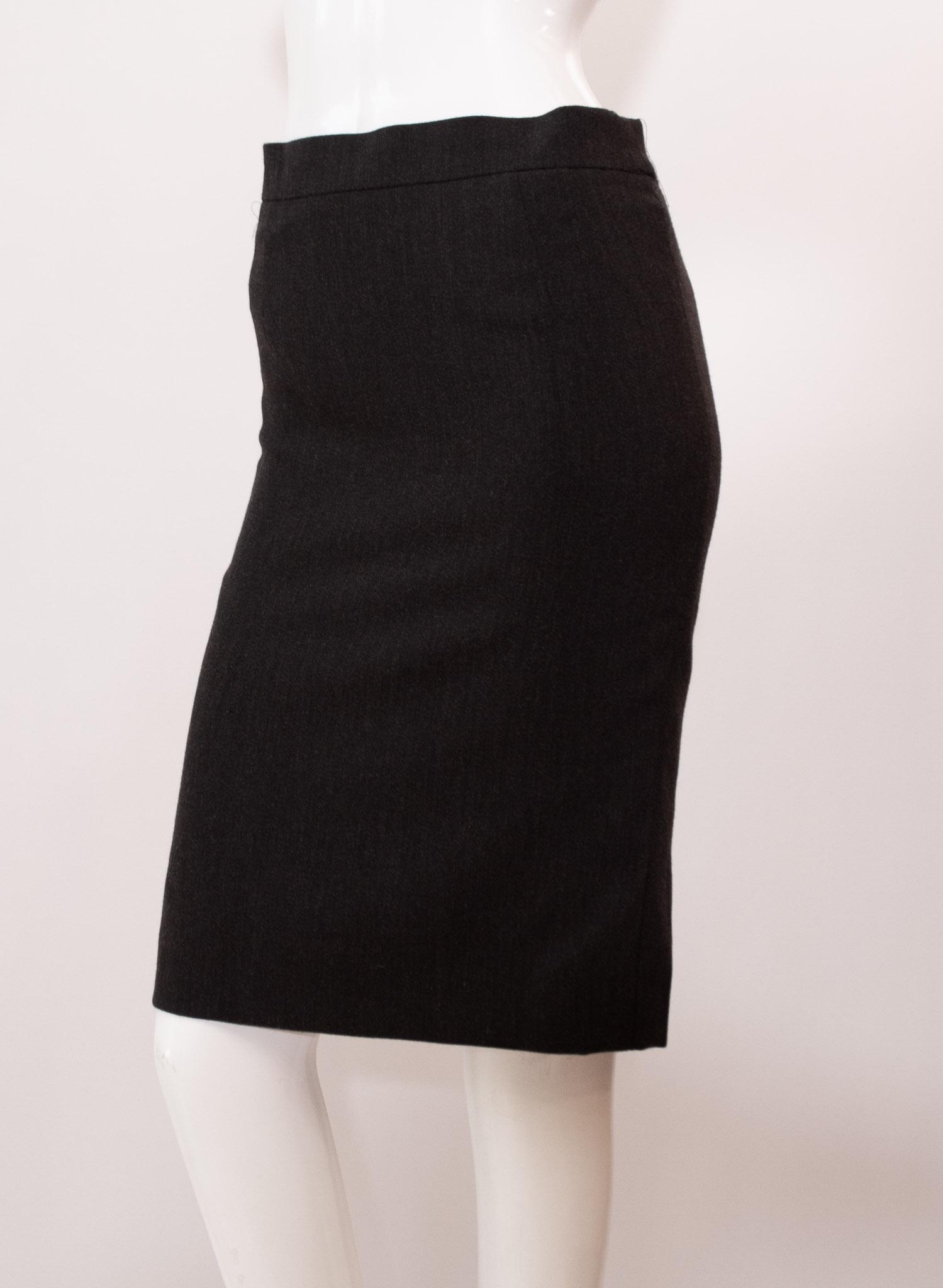 Escada Grey Wool Skirt vintage designer : Waist 30", Length 23": Escada Womens Vintage Designer Grey Wool Skirt US Size 6 approxThe Escada Gray Wool Skirt is crafted from a 100% wool fabric for comfort, warmth, and long-lasting durability. The modern gray finish an