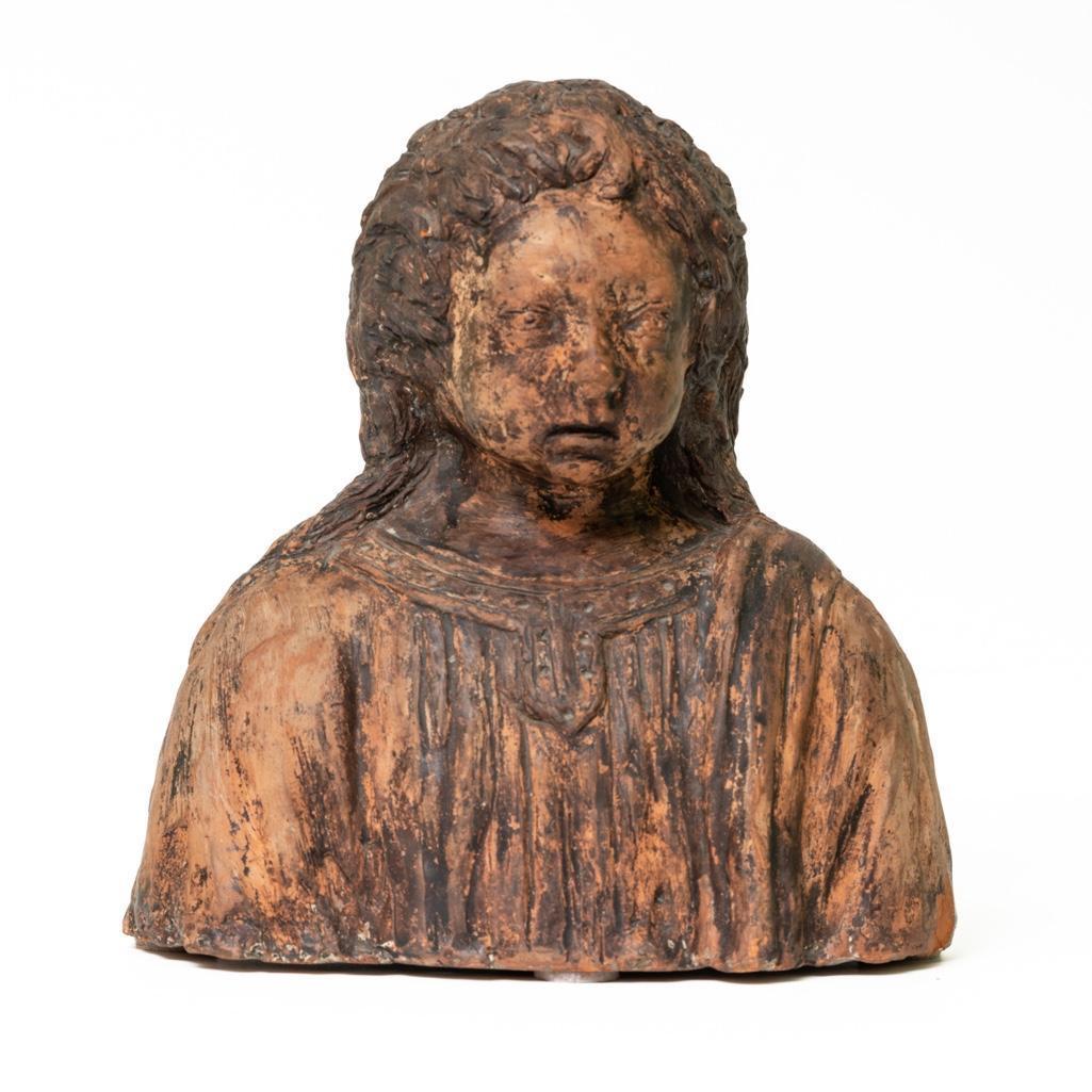 Early Terracotta bust of a male wearing Italian Late Rennaisance Gown: Early Terracotta Sculpture bust of a male wearing Italian Late Renaissance Gown This early terracotta bust depicts a male figure wearing an Italian Late Renaissance gown. The gown, which was popular d
