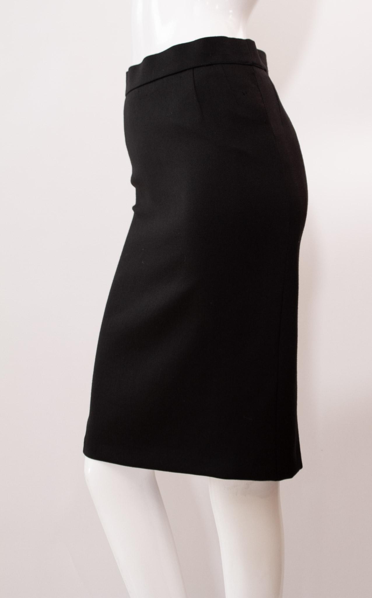 Escada Womens Designer Black Pencil Skirt Wool Eu size 42: Escada Womens Designer Black Pencil Skirt Wool Eu size 42Escada's Black Pencil Skirt is crafted from luxurious 100% wool fabric, offering superior breathability and comfort. Its timeless cut flatterin